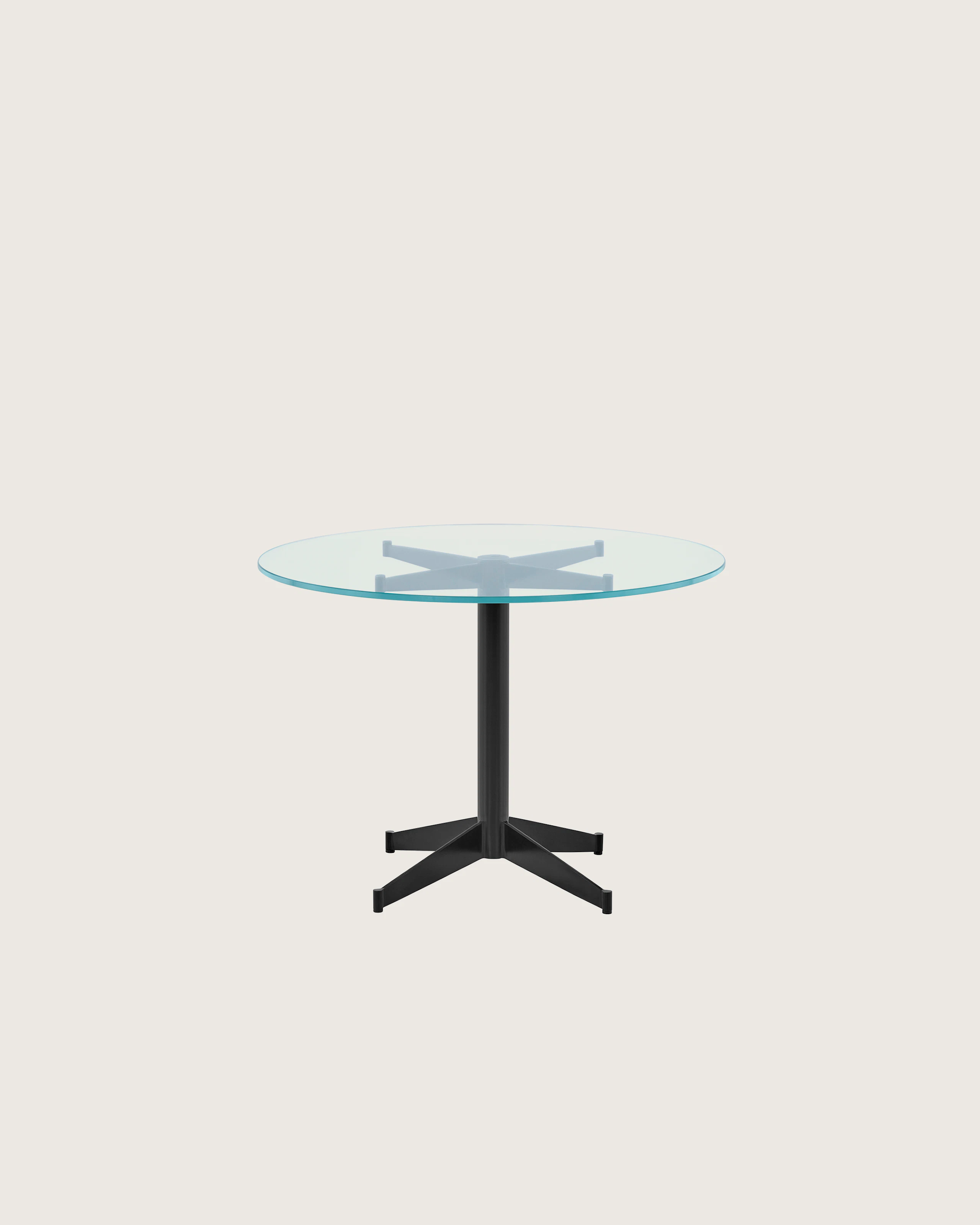 A round MP Occasional Table with a glass top and black base.