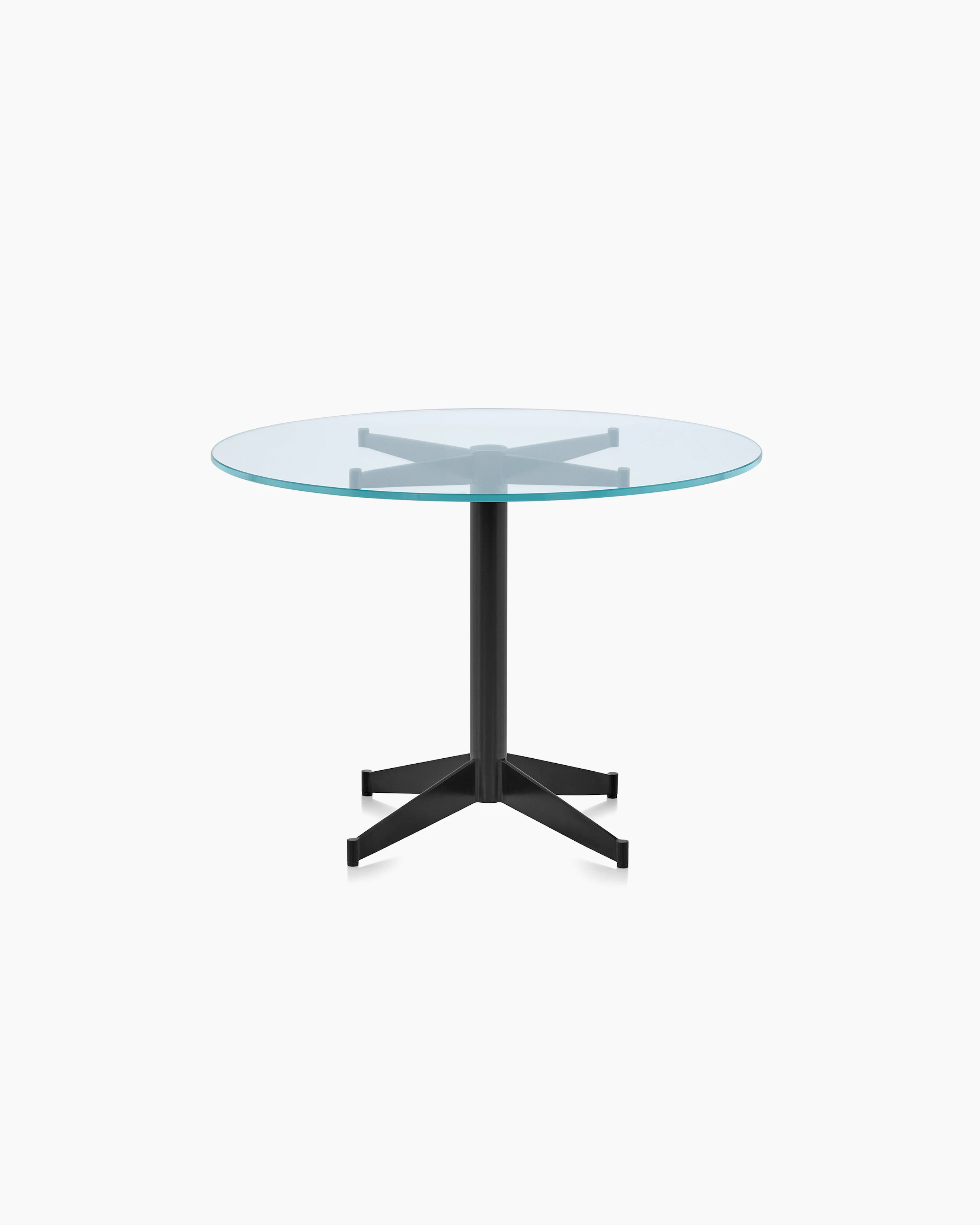 A round MP Occasional Table with a glass top and black base.