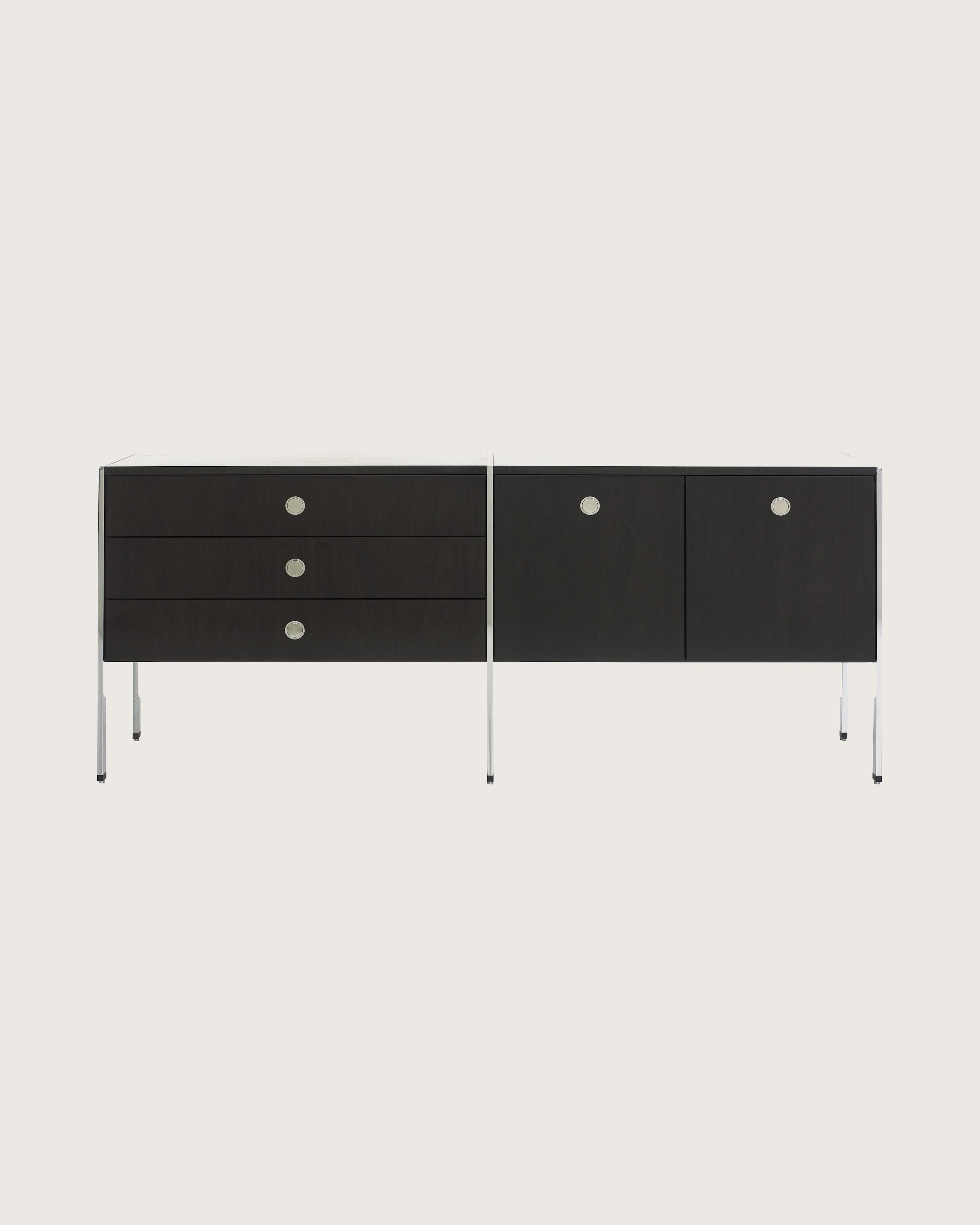 A two-unit H Frame Storage credenza with a dark wood finish and modules for box drawers and enclosed cabinets.