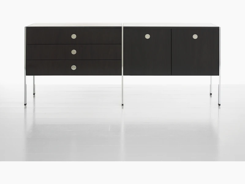 A two-unit H Frame Storage credenza with a dark wood finish and modules for box drawers and enclosed cabinets.