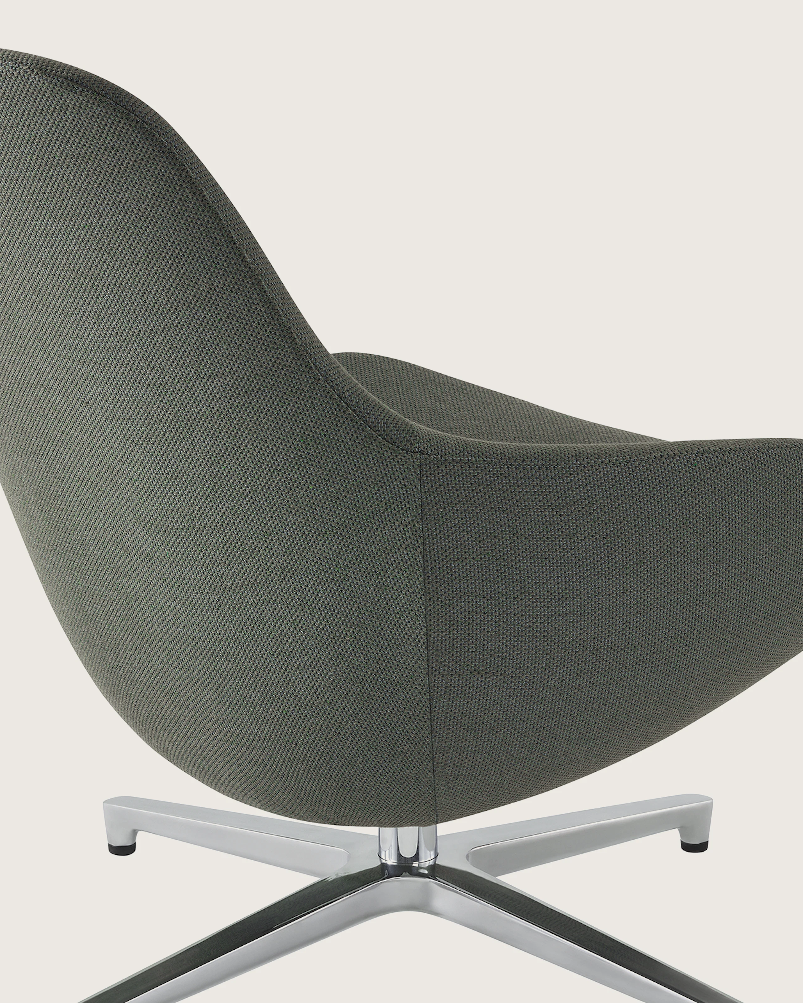 A Saiba Lounge Chair, viewed from the back at an angle.