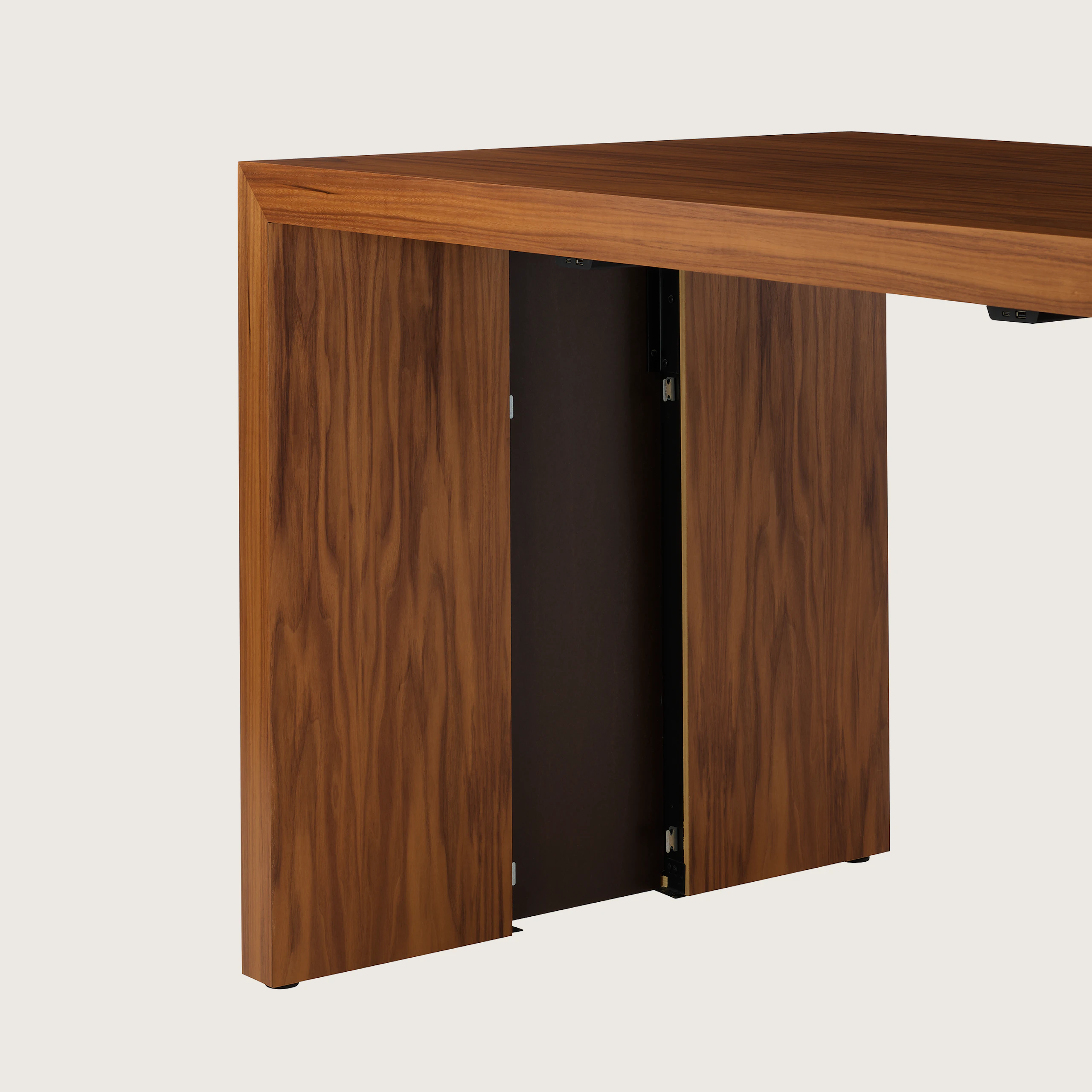 JD Waterfall Table in Walnut bar height, side detail view showing power storage option.