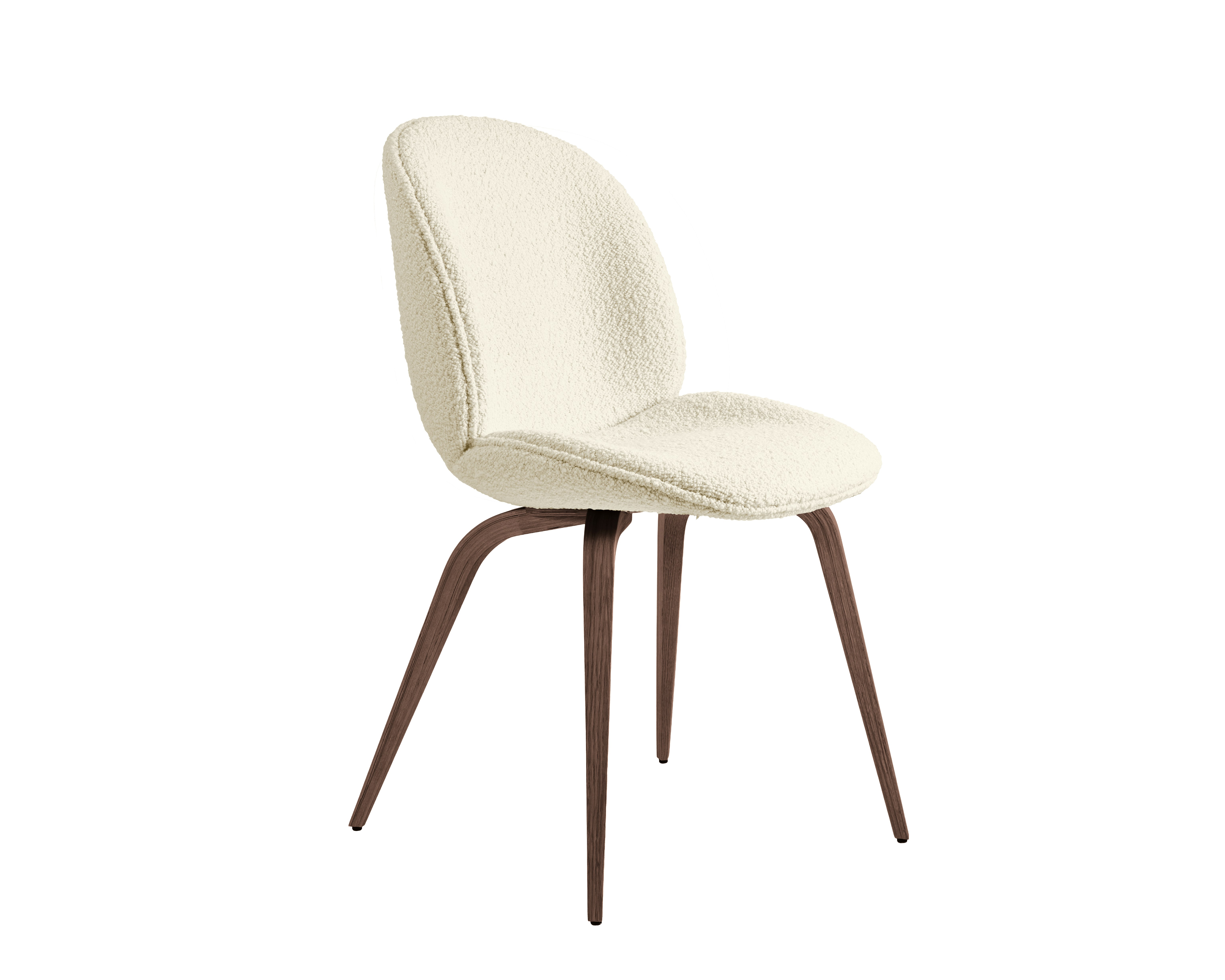 A Beetle Side Chair in cream, walnut viewed from an angle.