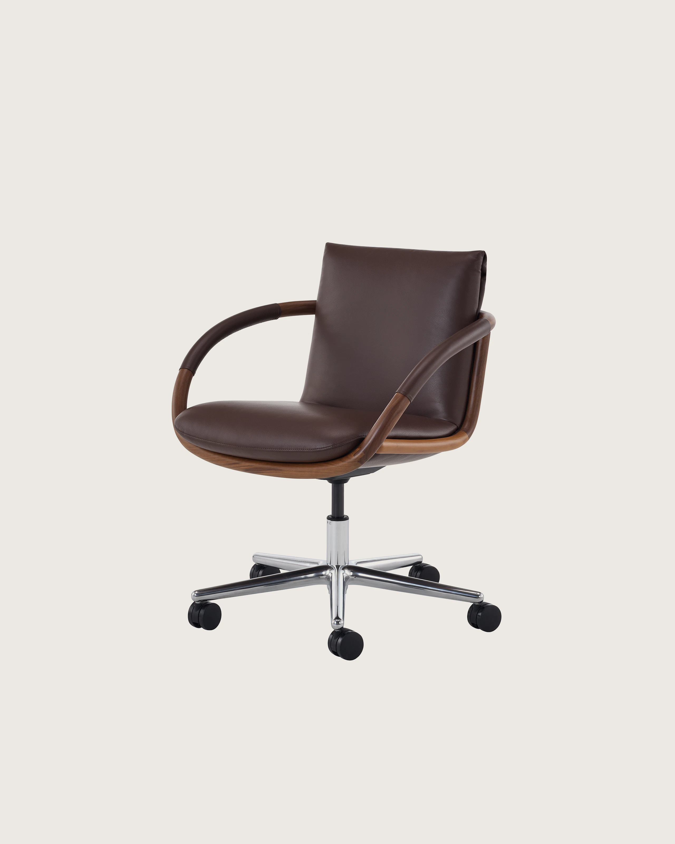 Full Loop Office Chair in Maharam Leather with Arm Wrapped details and five star base on casters.