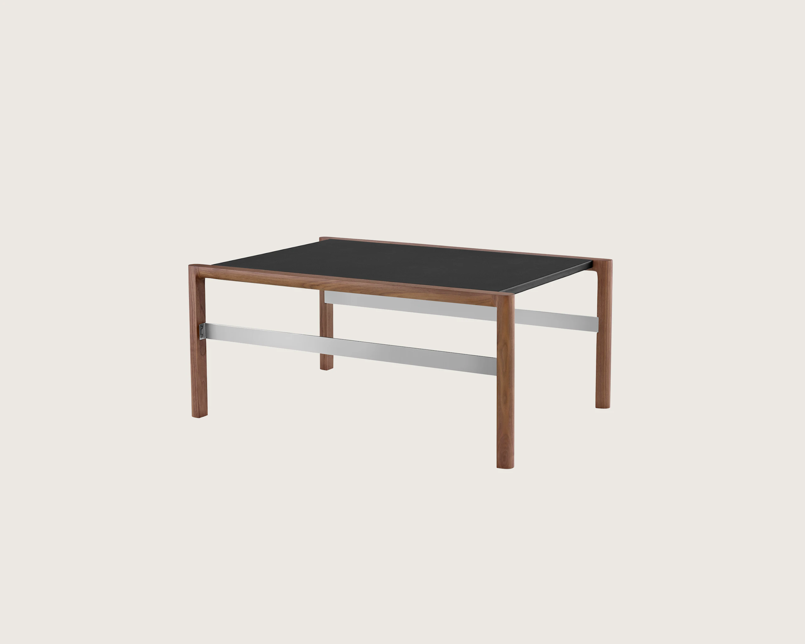 A rectangular Brabo Table with a leather-wrapped top and metal frame supports, viewed at an angle.