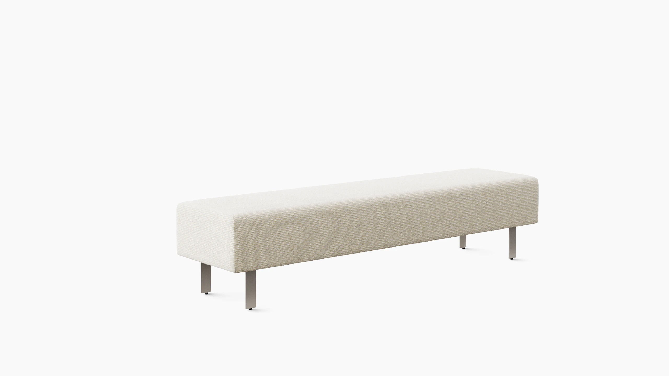 A light colored upholstered bench seat is shown from an angle.