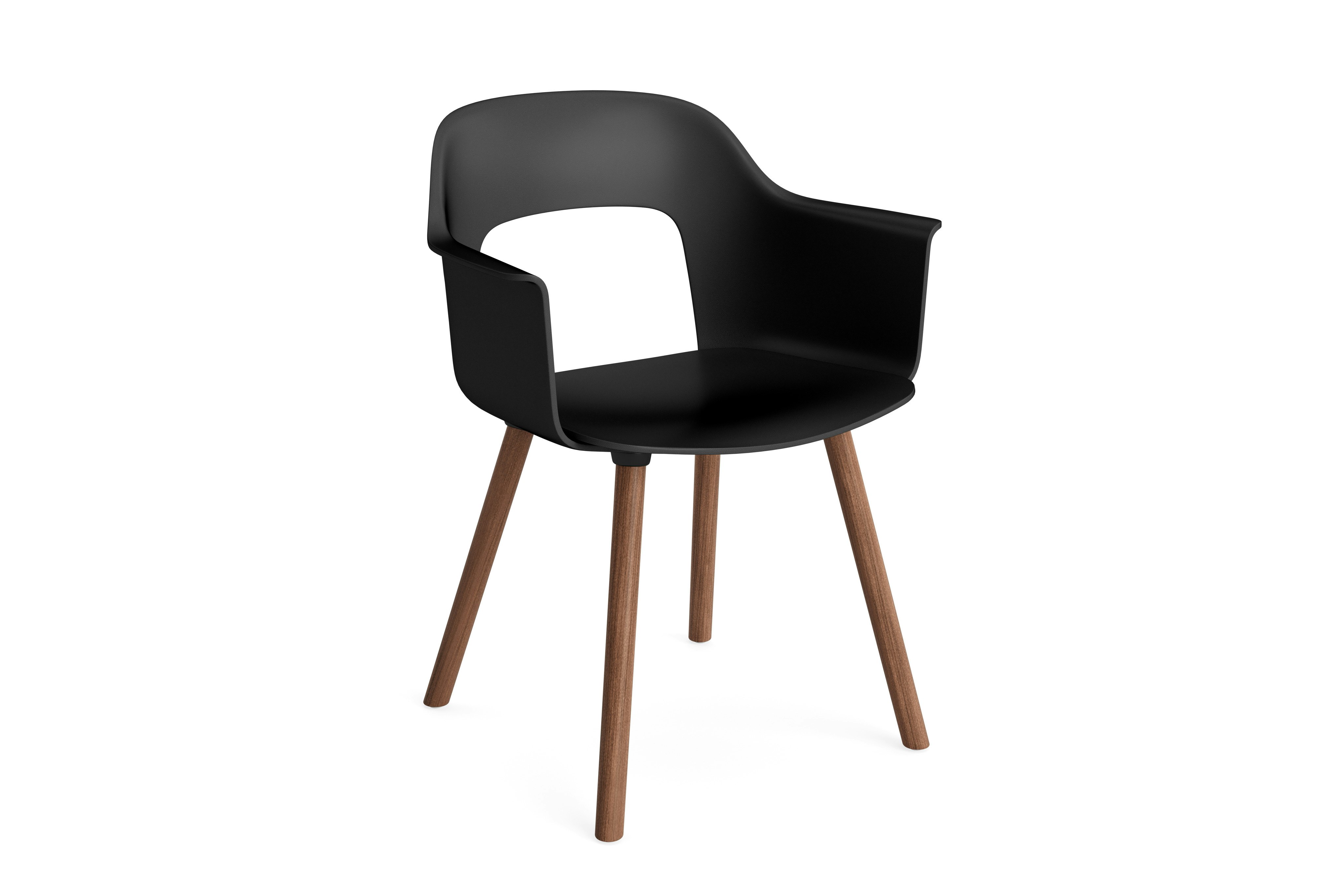 Plastic shell armchair on 4 wood legs, angled view