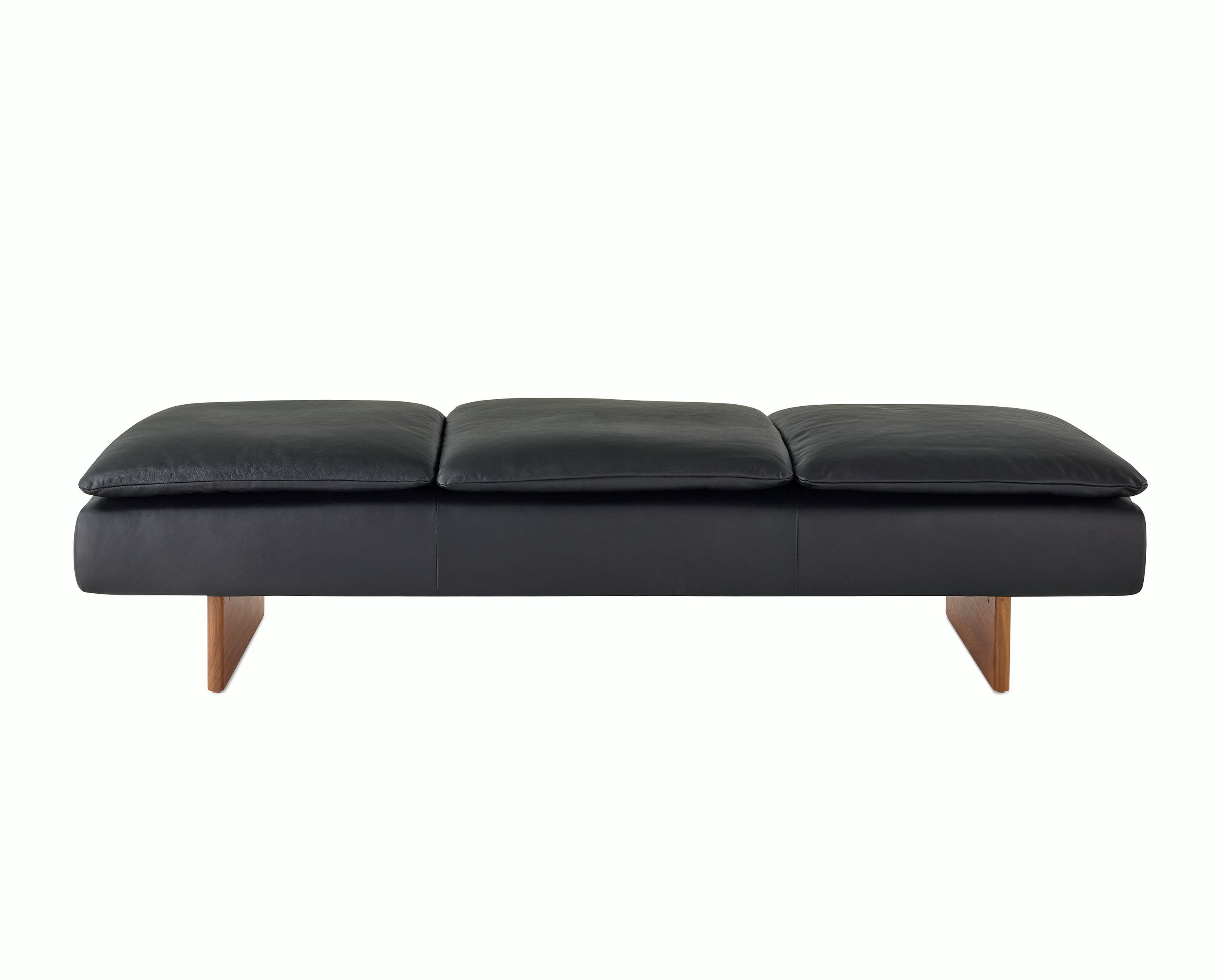 Mantle Three Seater Bench in Black Leather with a Walnut Base, viewed from the front.