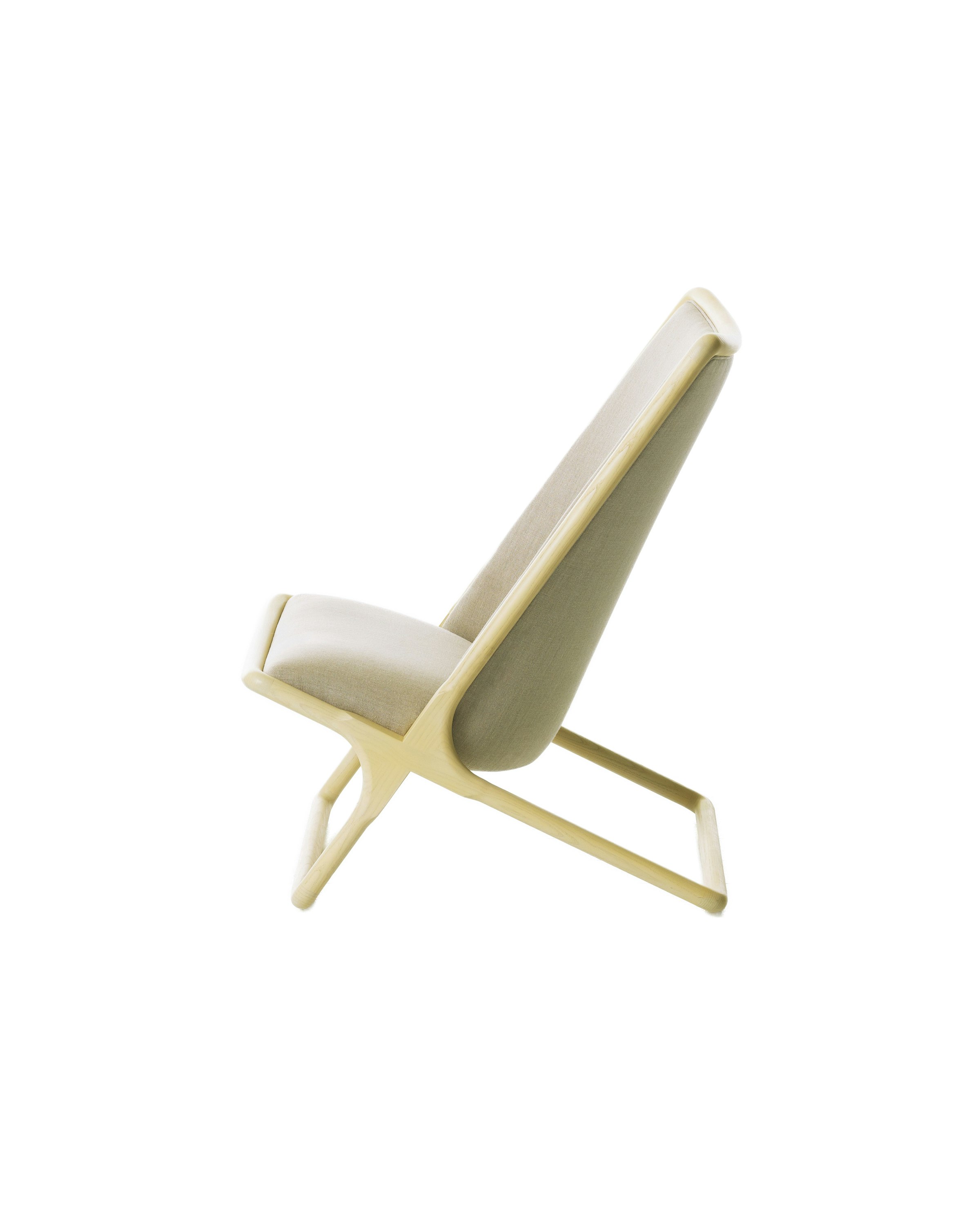 Scissor chair in white ash upholstered in a beige material as viewed from the side.