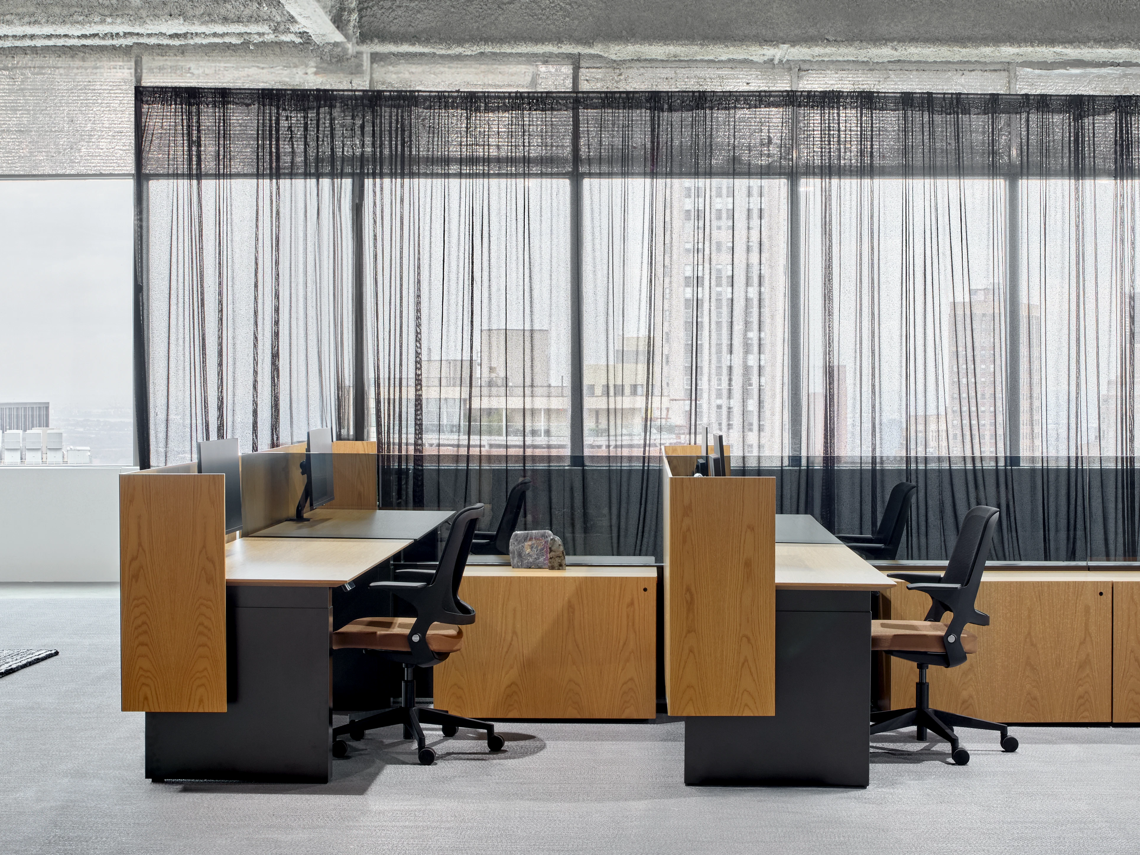 Workstations furnished with Knoll Ollo Chairs in an open office setting.