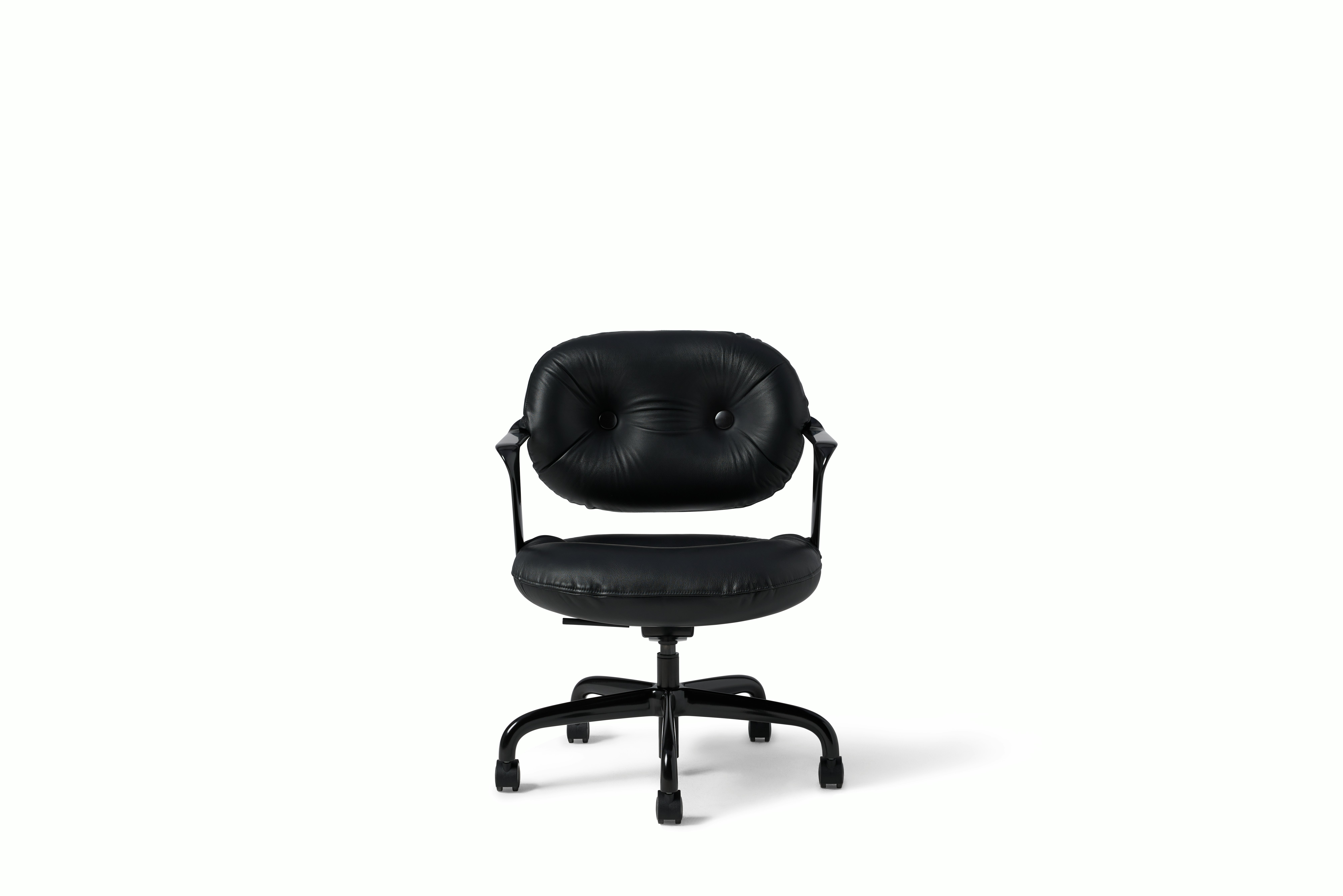 Front view of a Morrison Hannah chair with a black frame and base with fixed arms and black leather upholstery.