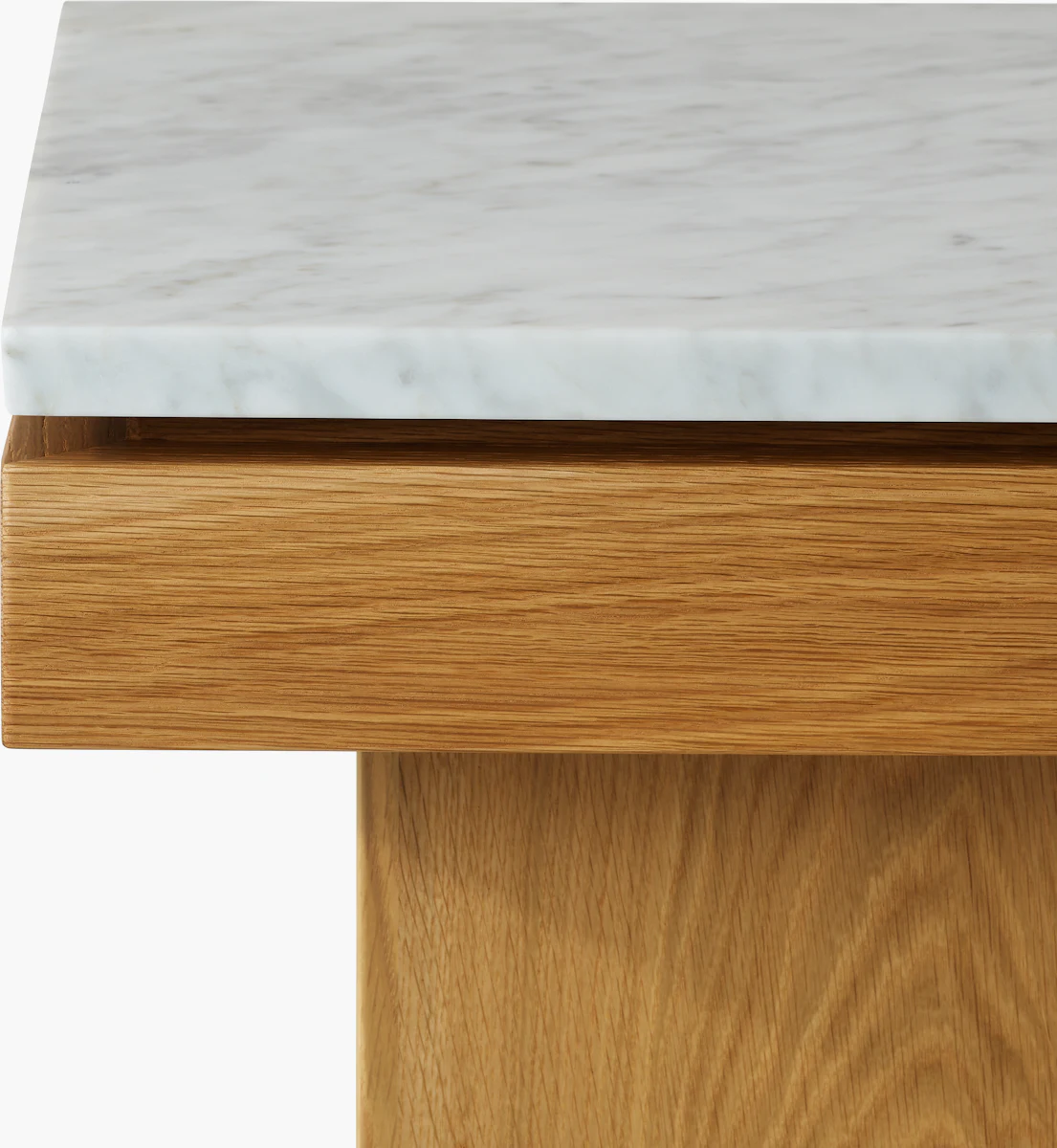 Close-up of marble top and wooden base of coffee table