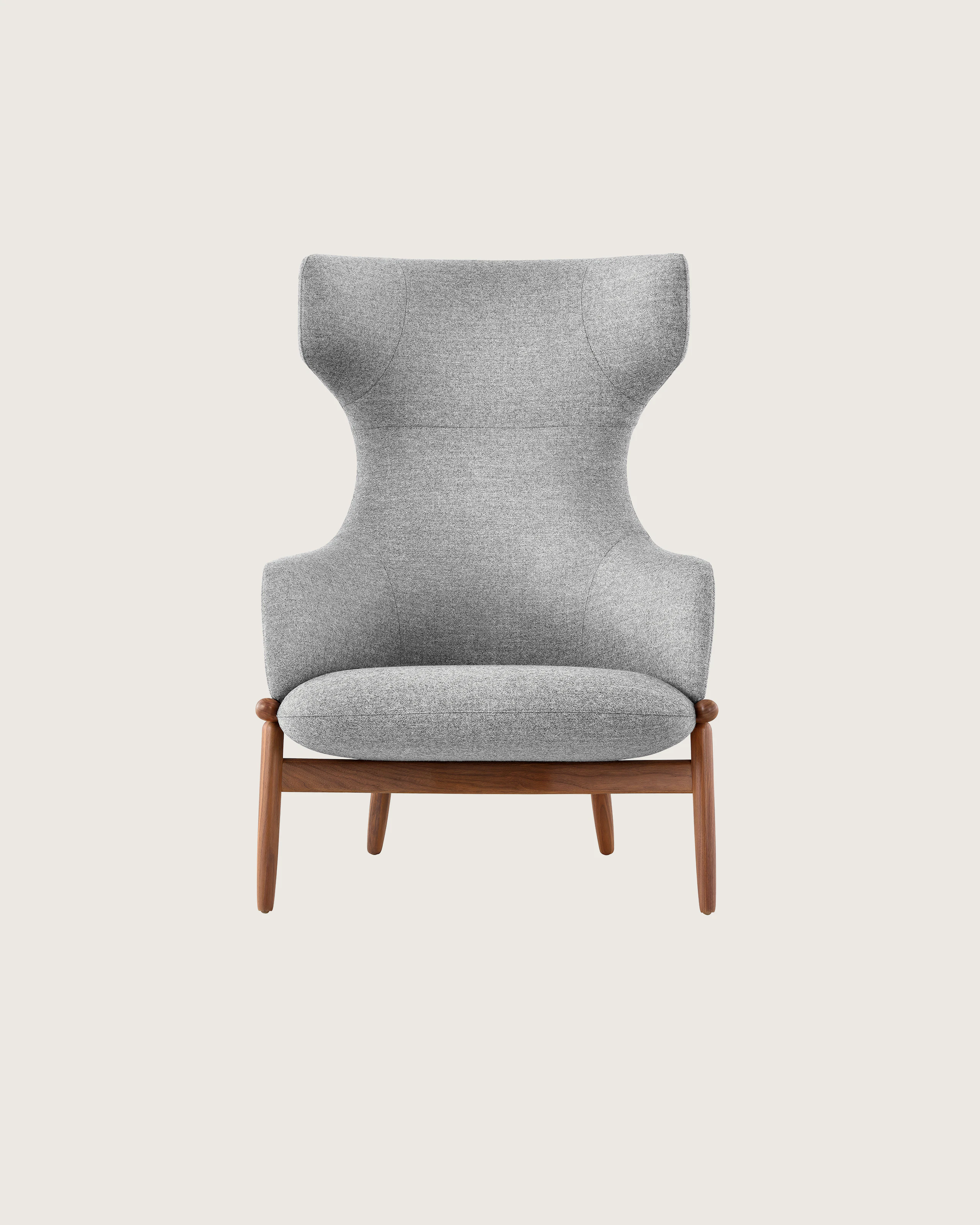 A wing-back Reframe Lounge Chair in Panno Di Dolce Flannel, viewed from the front.