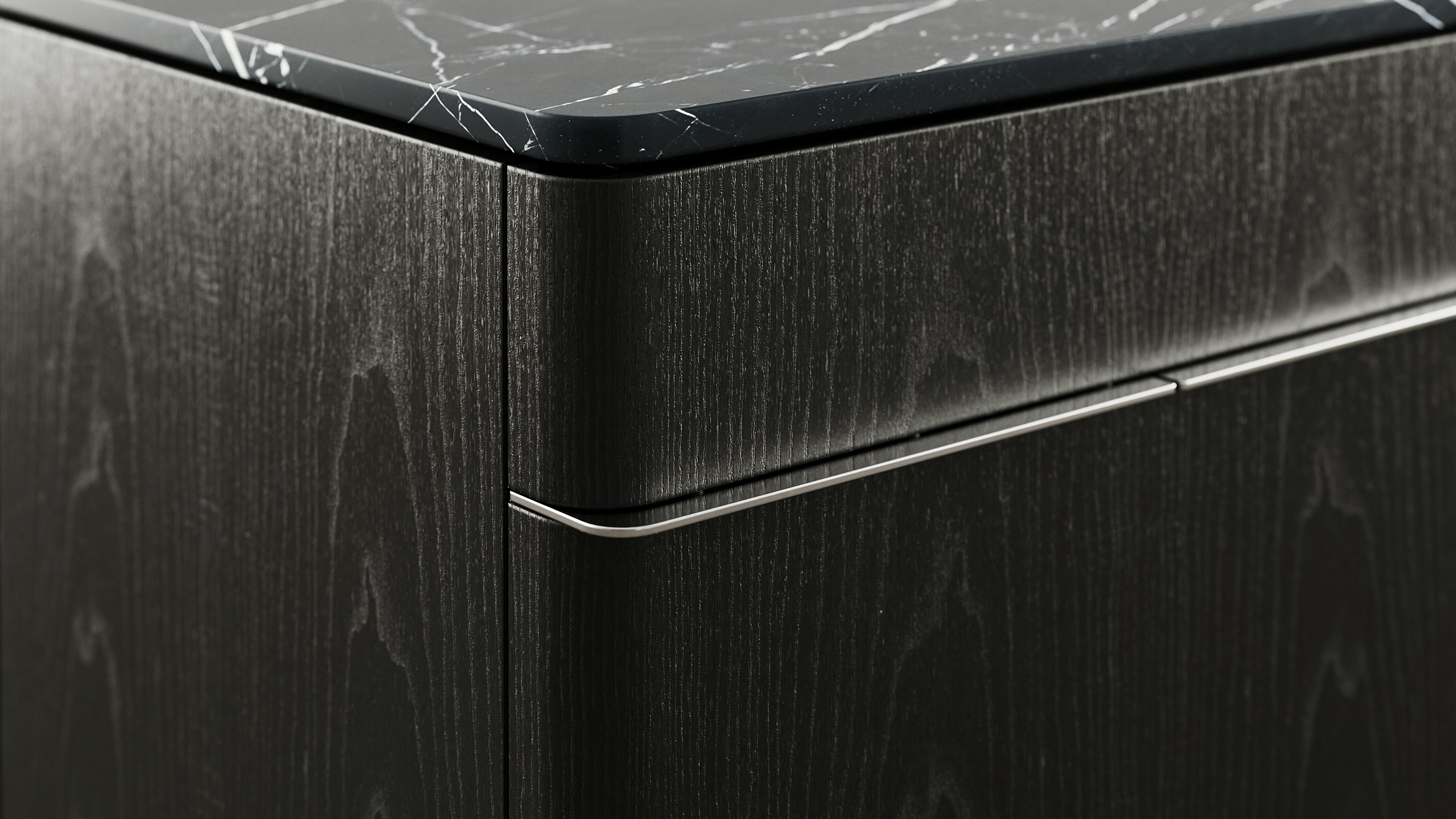 Detail shot of Ascent Credenza designed by EOOS in Ebonized Ash with a Nero Marquina marble top showing the credenza corner.