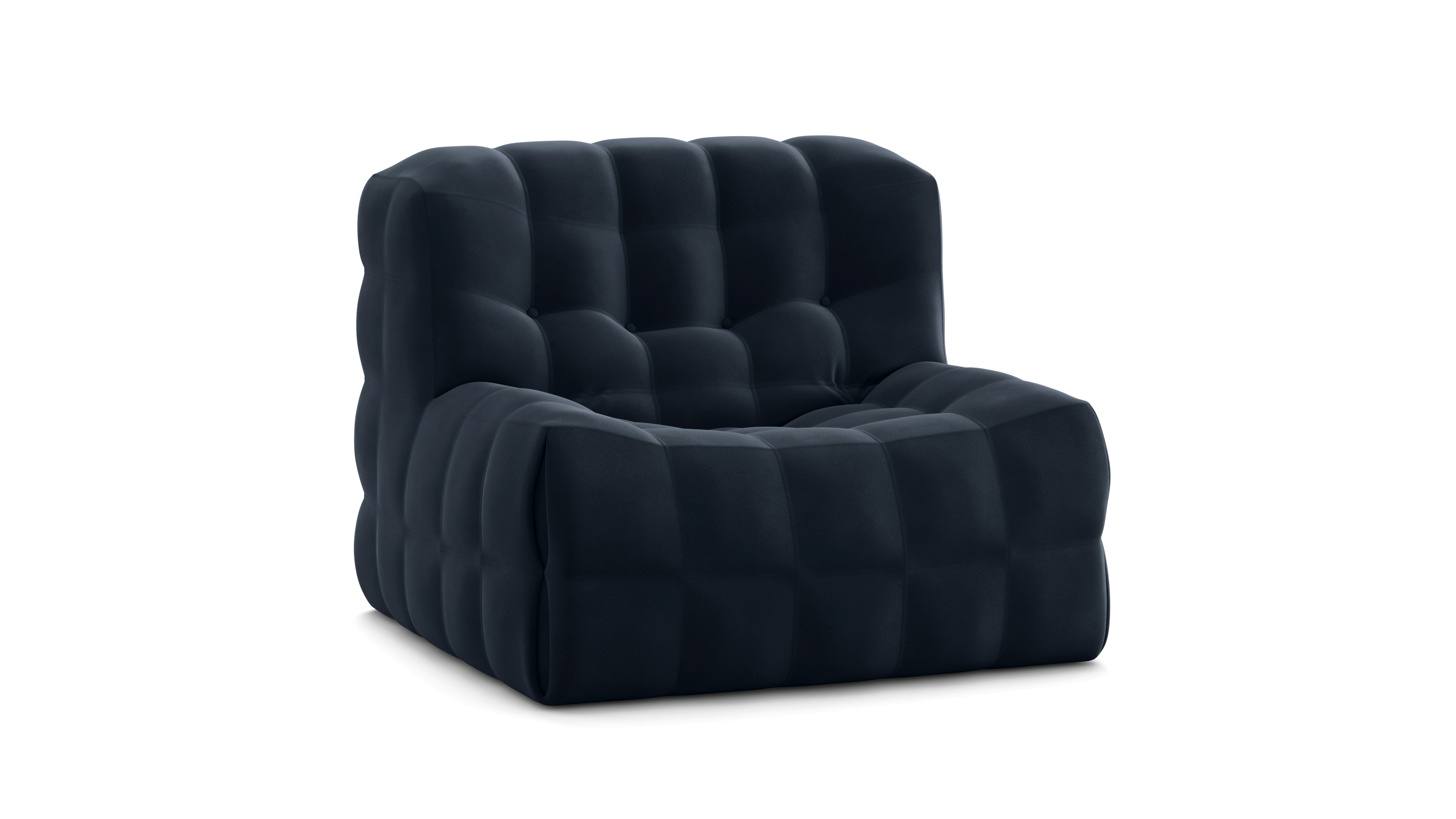 A Kashima Armchair in Moon Velvet Jean viewed from an angle.