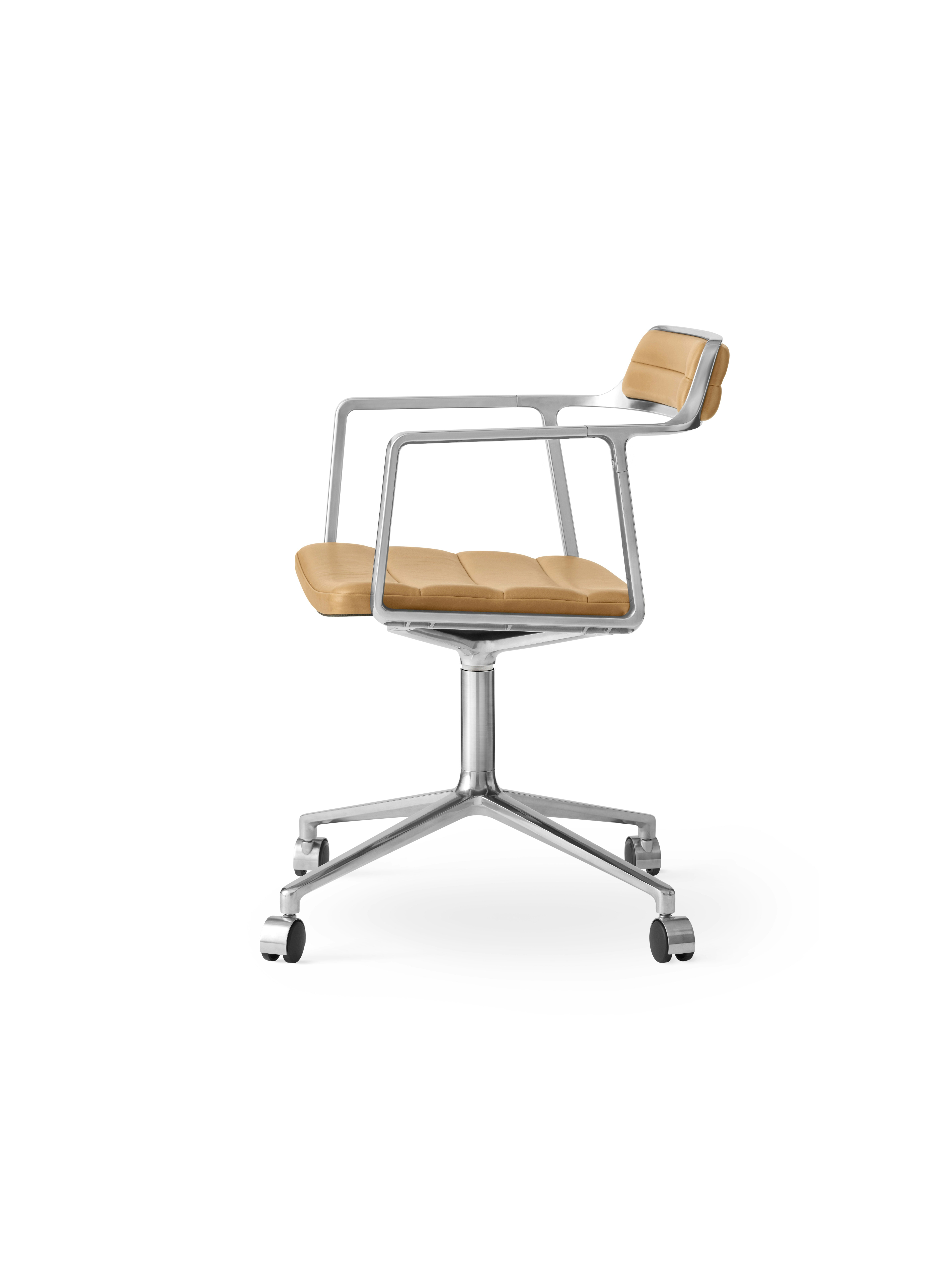 A Vipp452 Swivel Chair Viewed from an angle.