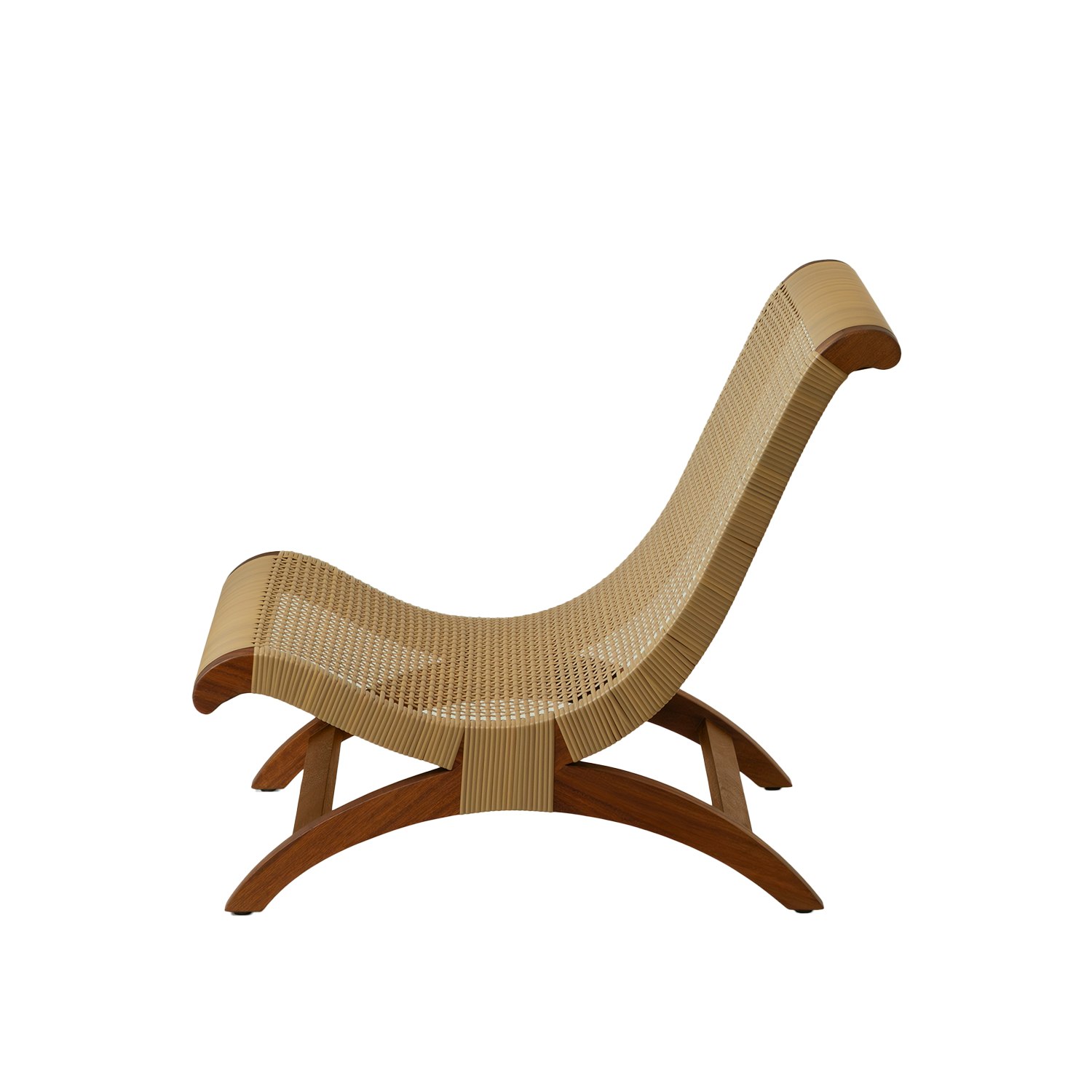 A Butaque Clasica Outdoor Lounge Chair in iroko all weather cane viewed from the side.