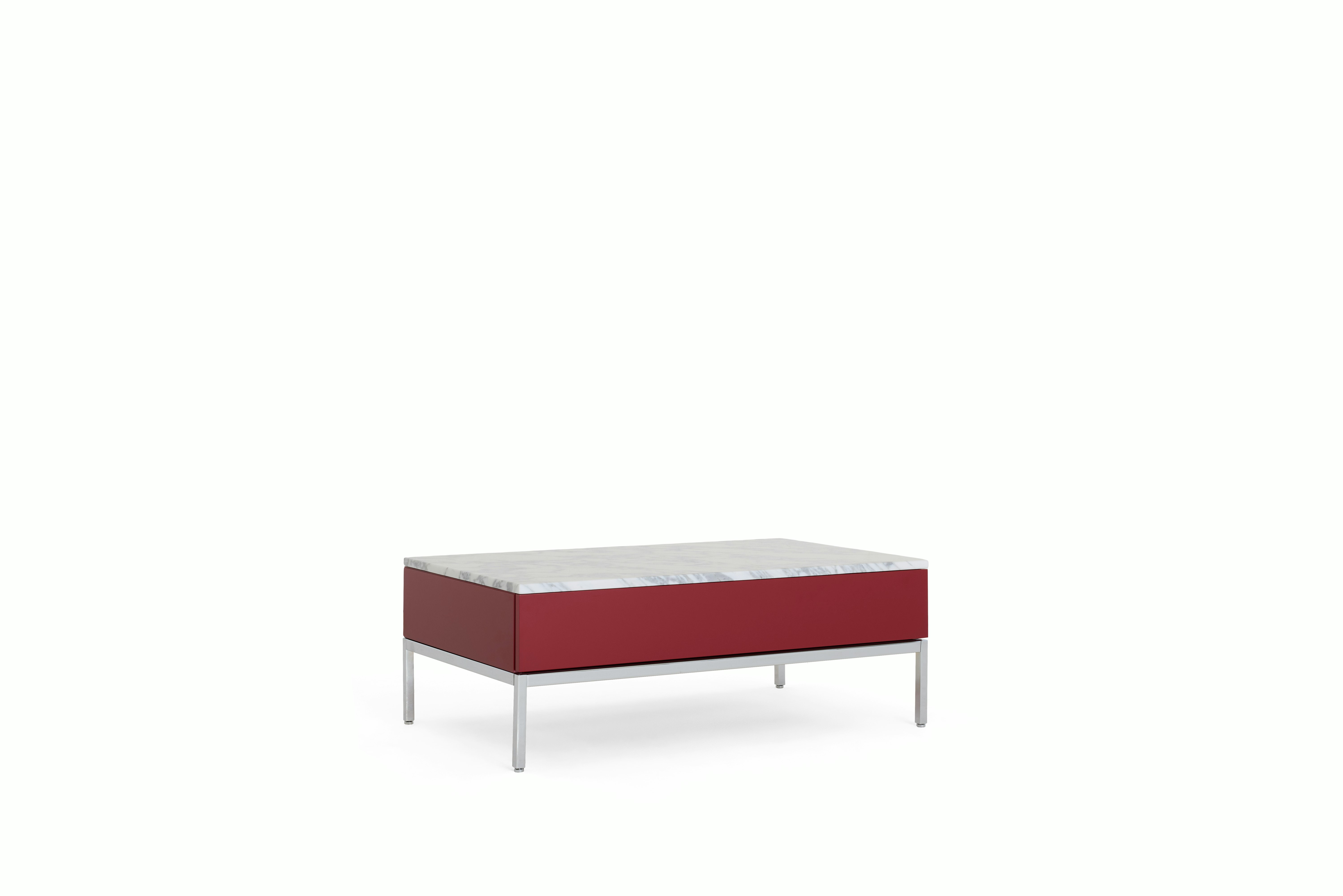 A Knoll Chermayeff Coffee Table in Dark Red Lacquer, Carrara Satin Coated Marble viewed from an angle.
