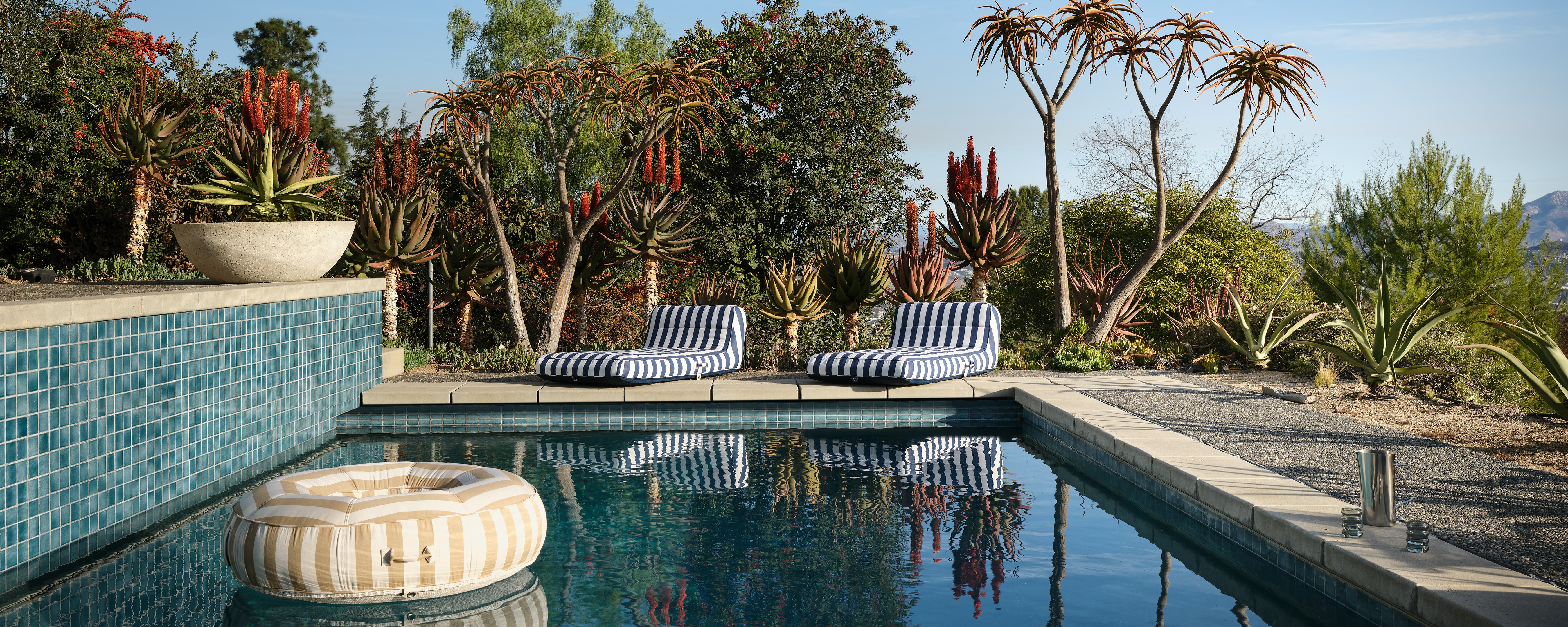 Ring Lilo Pool Float and Lilo Pool Float in a swimming pool setting