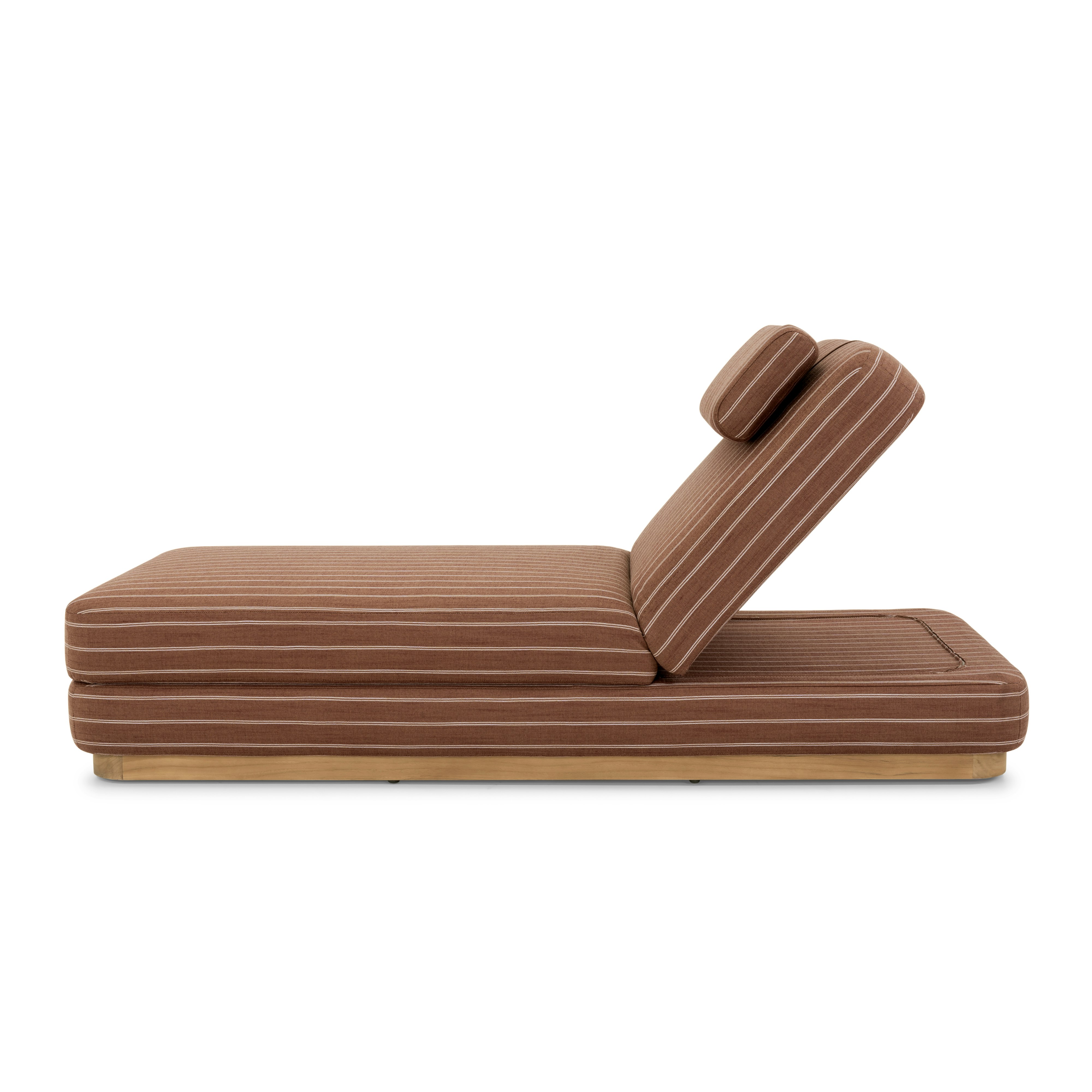 A Stack Outdoor Chaise in Terra Rossa viewed from the side.