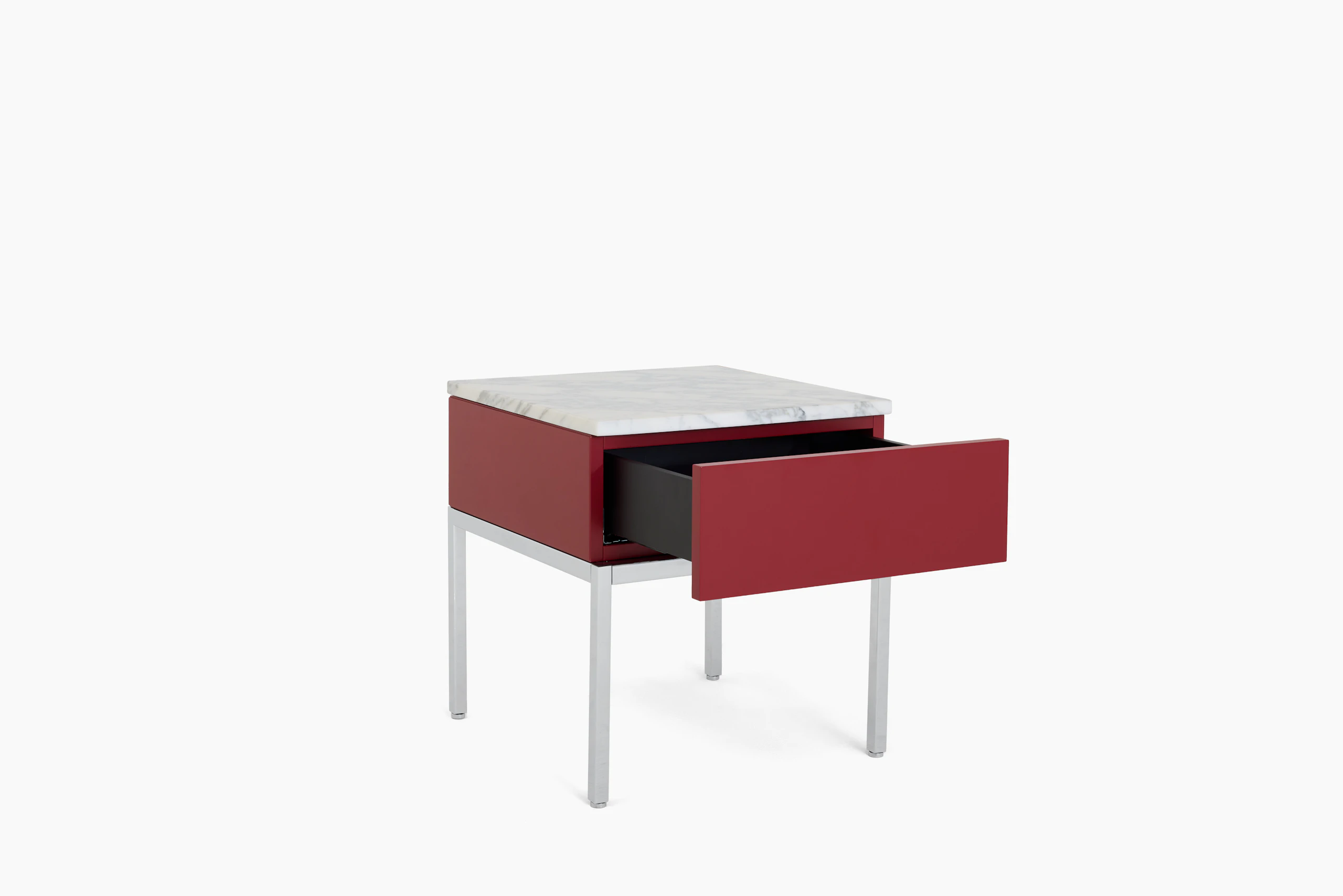 A Knoll Chermayeff Side Table in Dark Red Lacquer, Carrara Satin Coated Marble viewed from an angle.