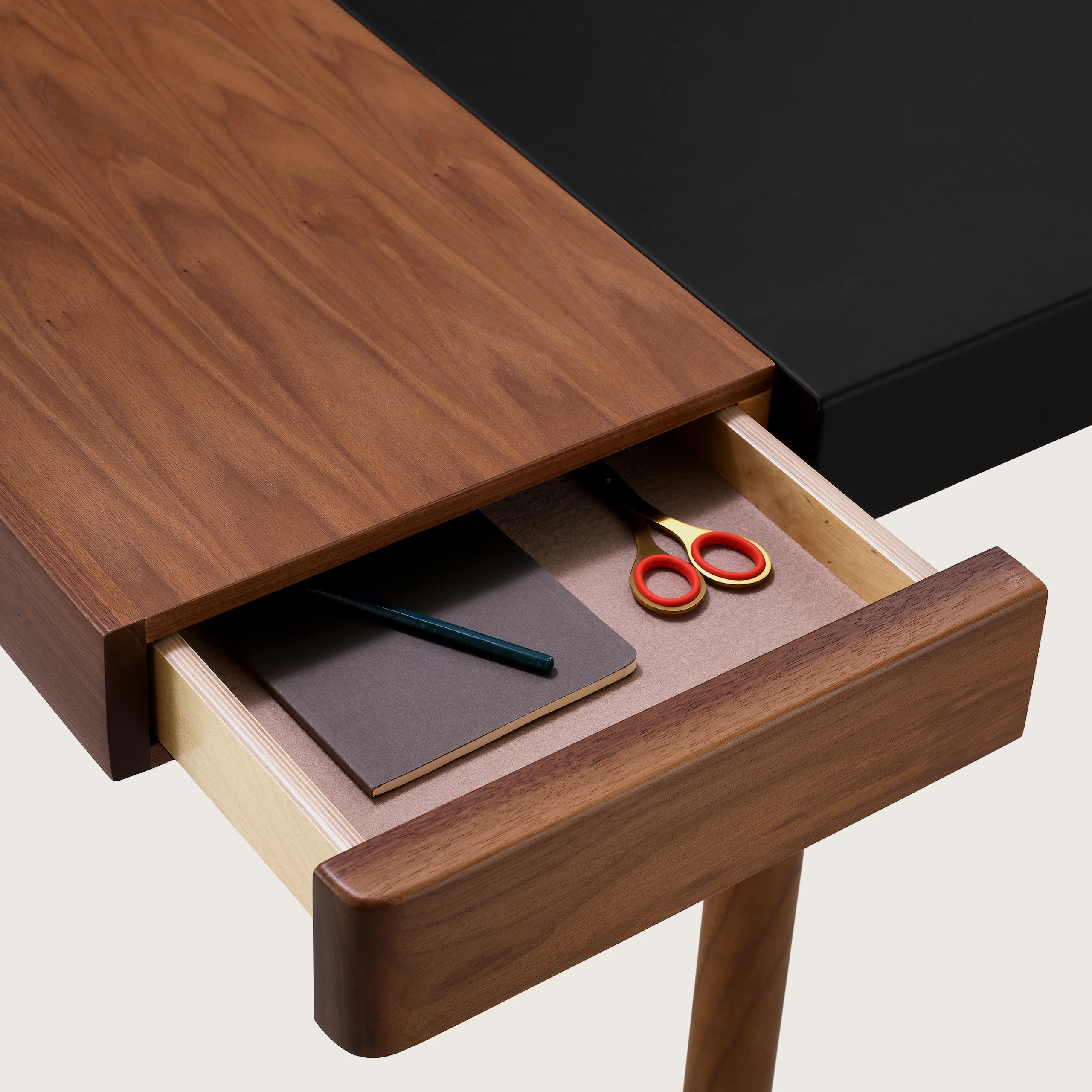 New Canaan Leathewrap Sit-to-Stand Desk with open drawer on left side.