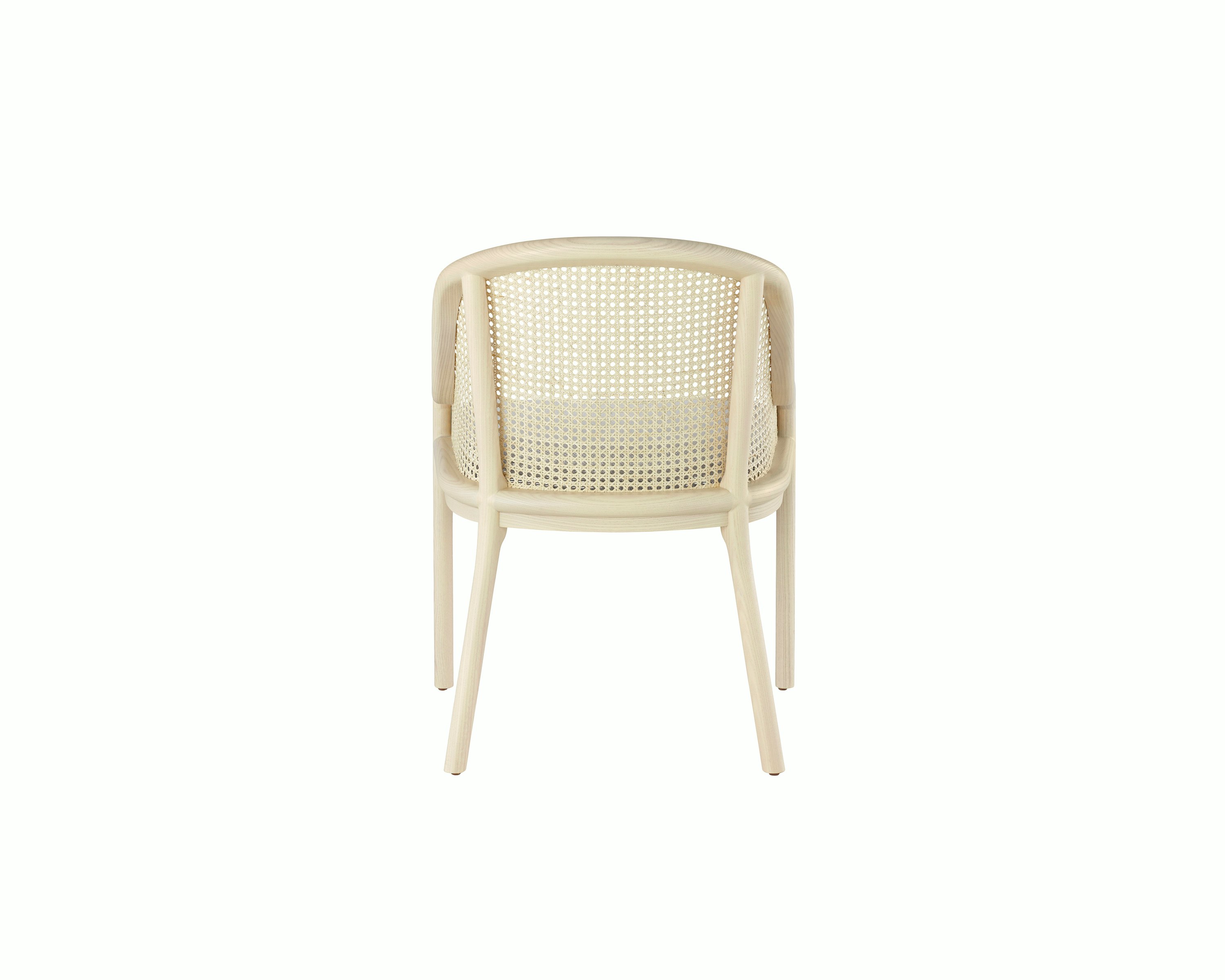 Landmark Chair with a cane back and a seat upholstered in a Double Beam textile, viewed from the back.