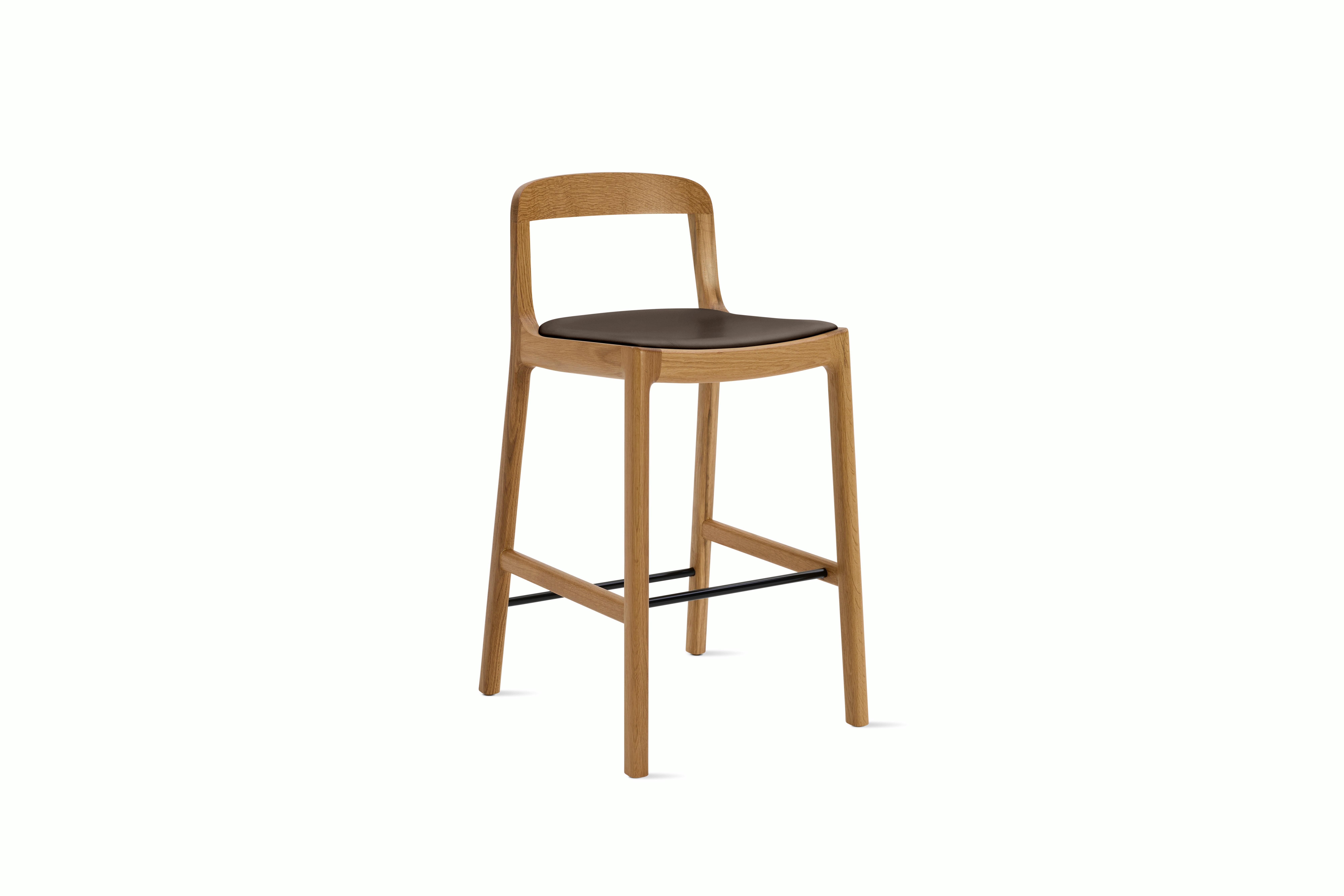 A Lijn Stool in Java Oak viewed from an angle.