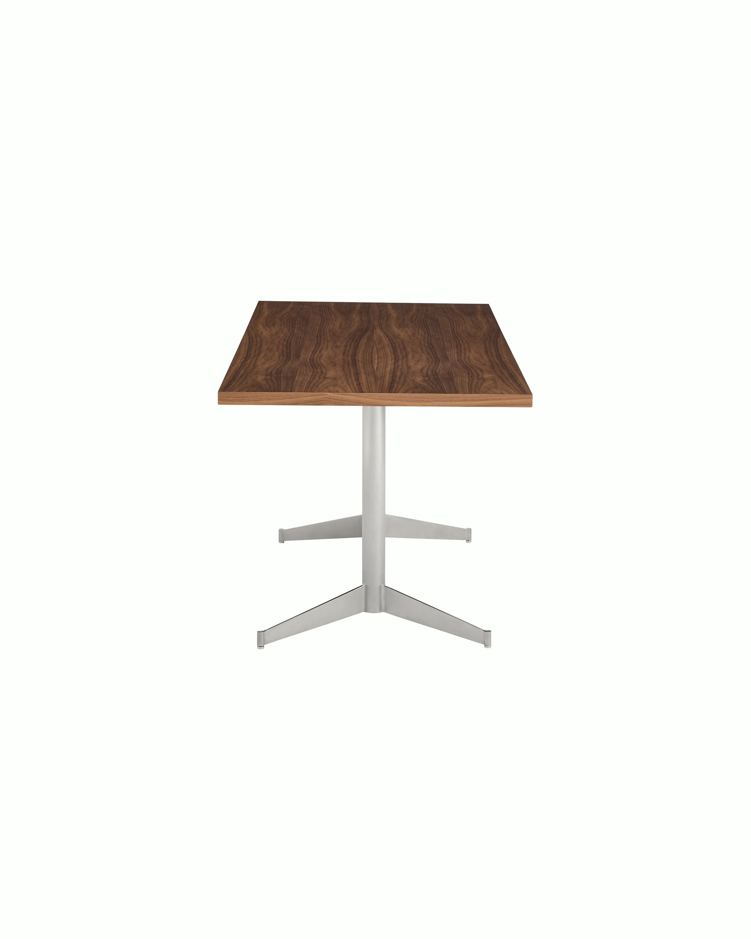 MP Table designed by Amir Paknya for Geiger in Natural Flat Cut Walnut with a Satin Chrome base shown on a white sweep, side view.
