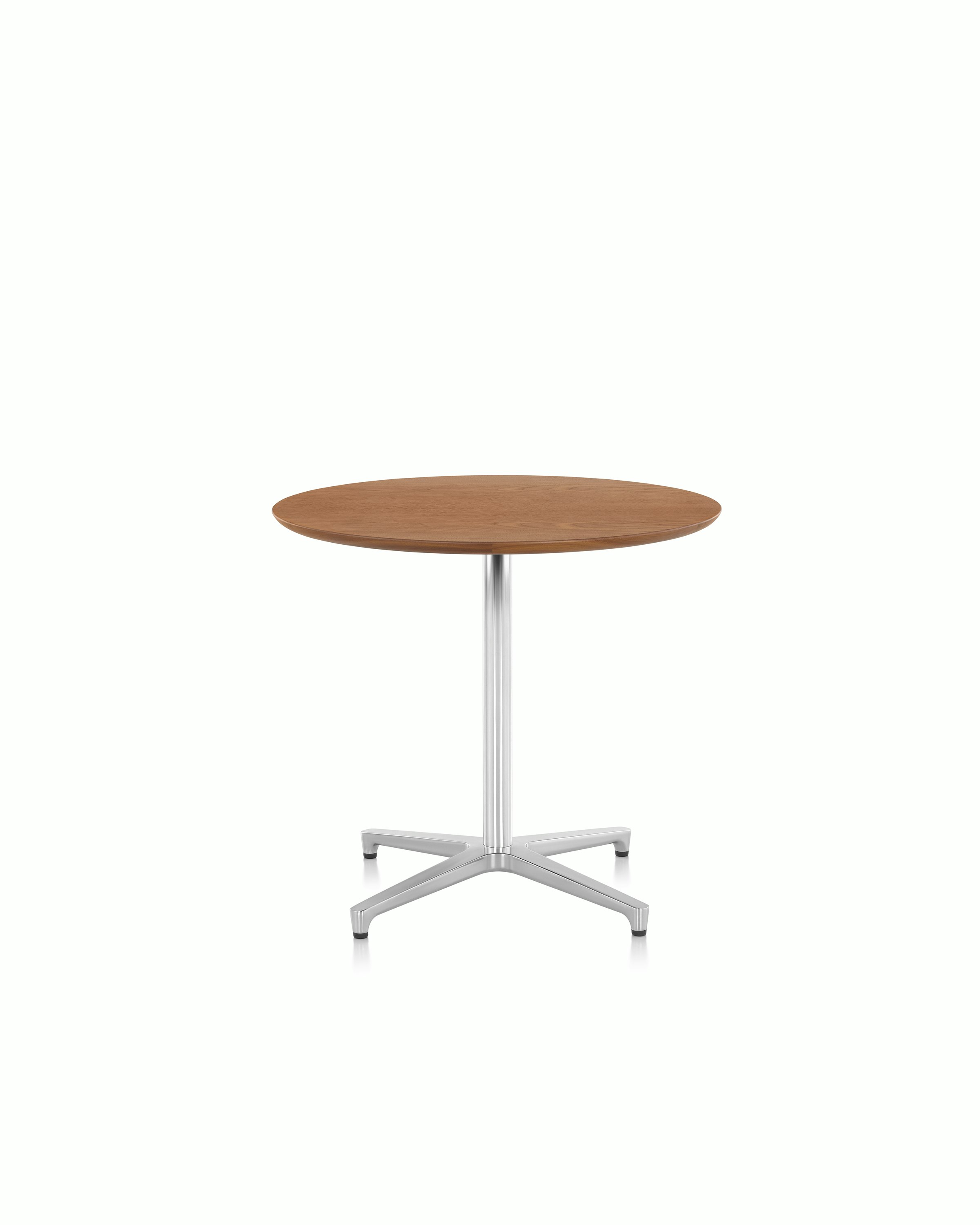 A round Saiba occasional table with a veneer top and aluminum pedestal base.
