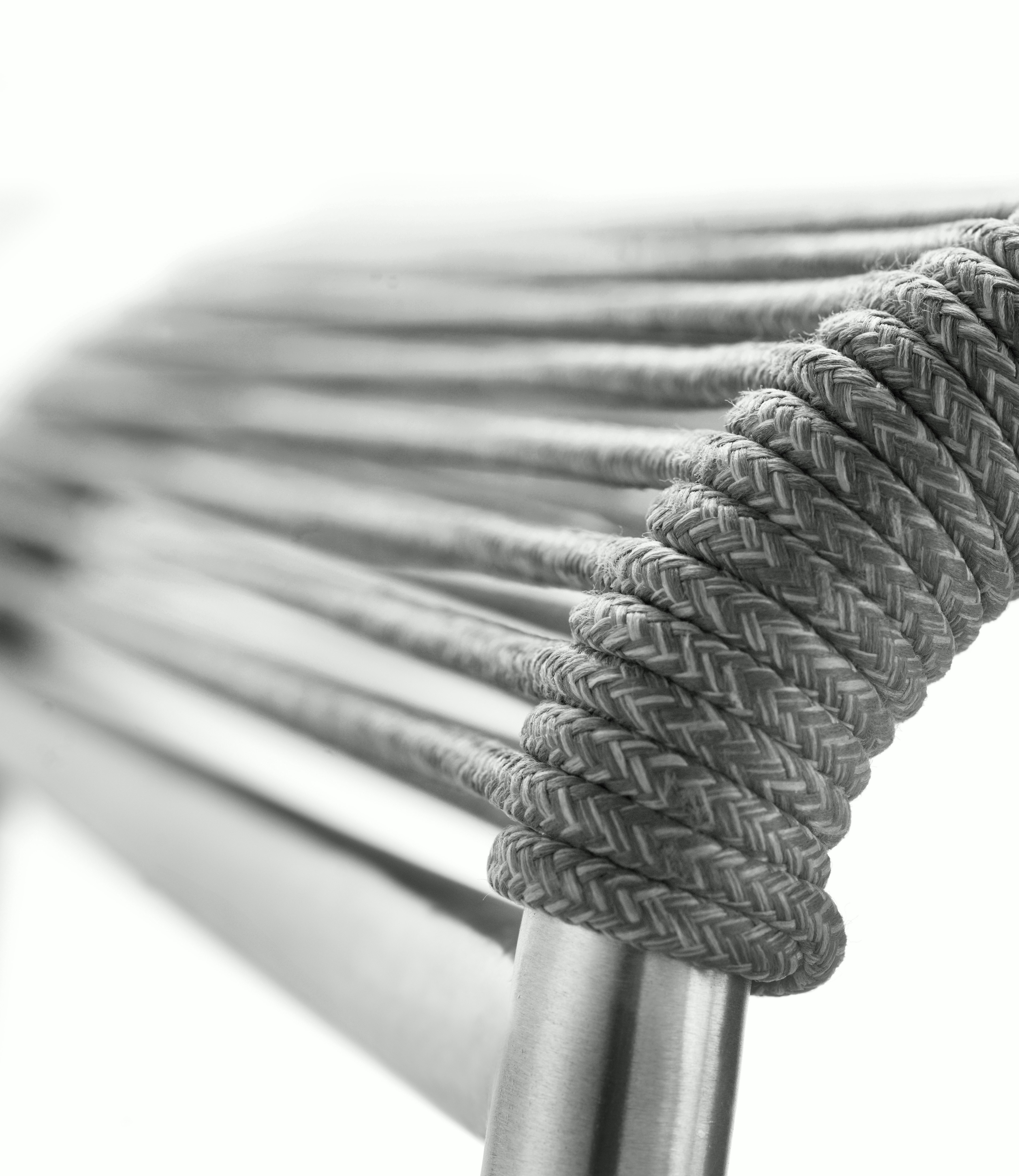 A detailed look at a Teglgaard Outdoor Dining Chair in Light Grey.
