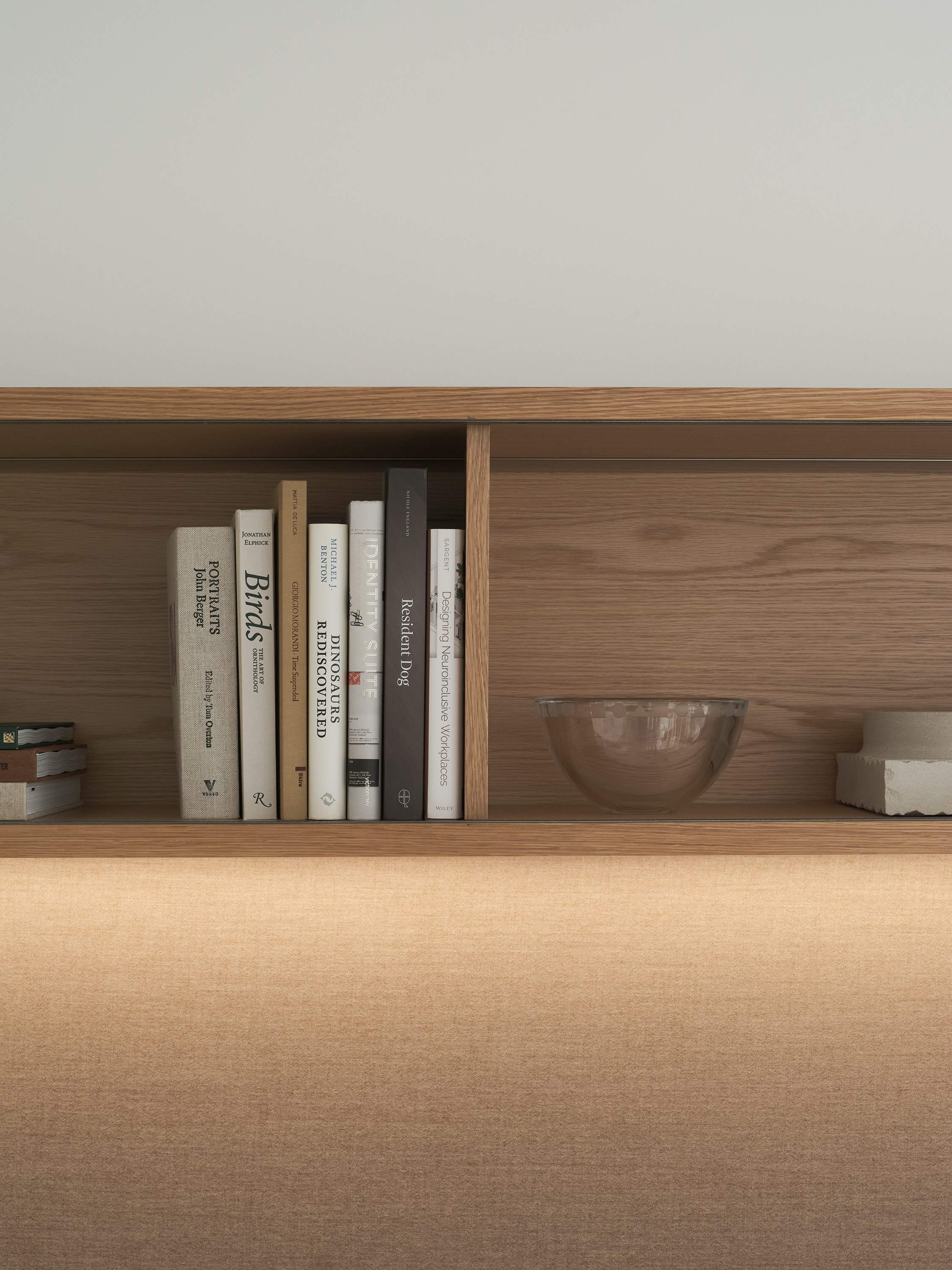 Geiger One Private Office overhead storage with an open double shelf in Natural Flat Cut Oak and integrated lighting, shown from the front.