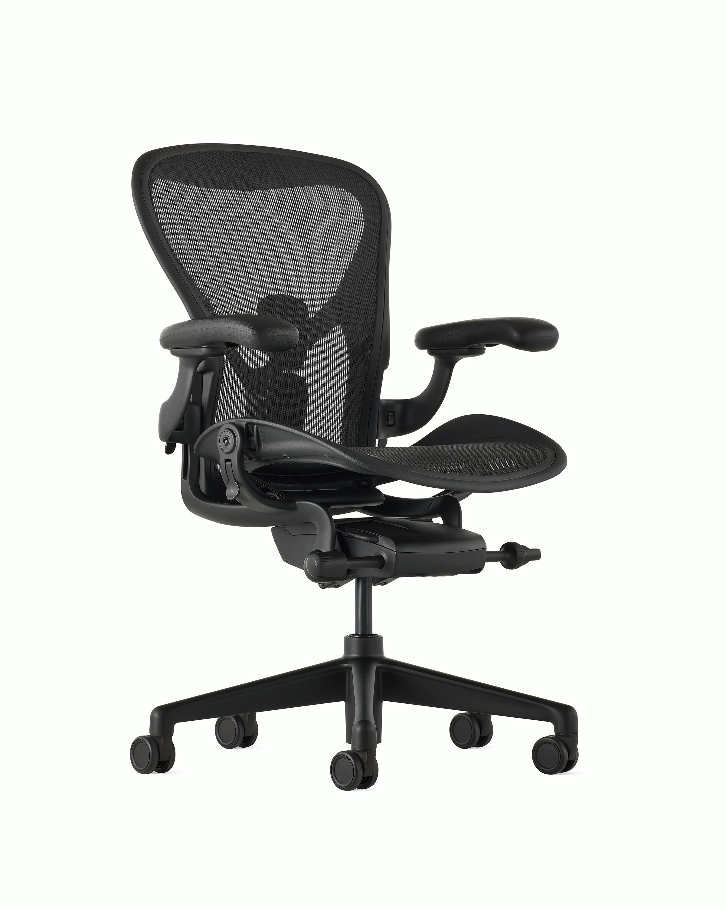 Black matte Aeron Chair on a white background with a 5-star base and ergonomic back support, angled view of the chair front.