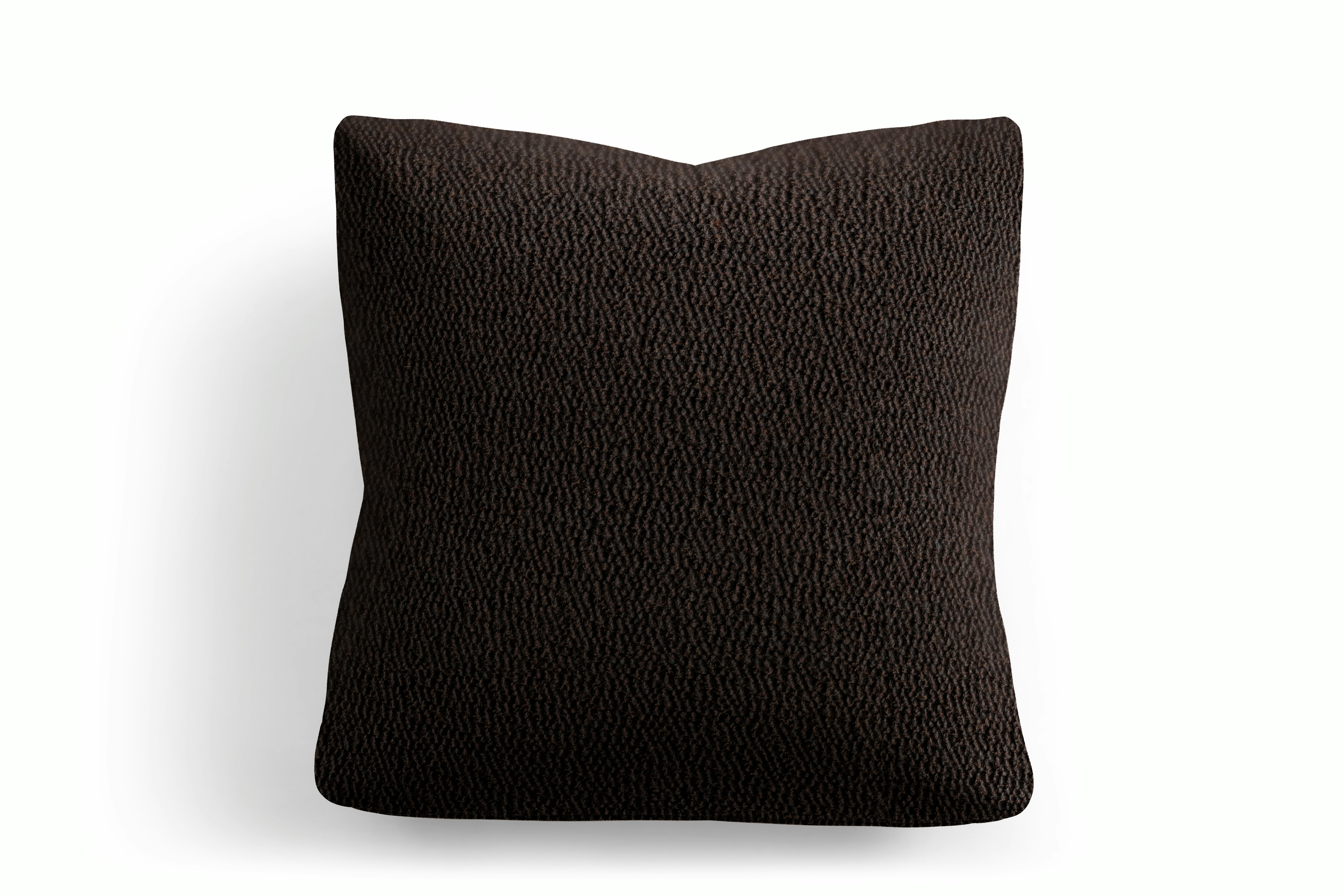 A Irvin Throw Pillow in Brown Viewed from the front.