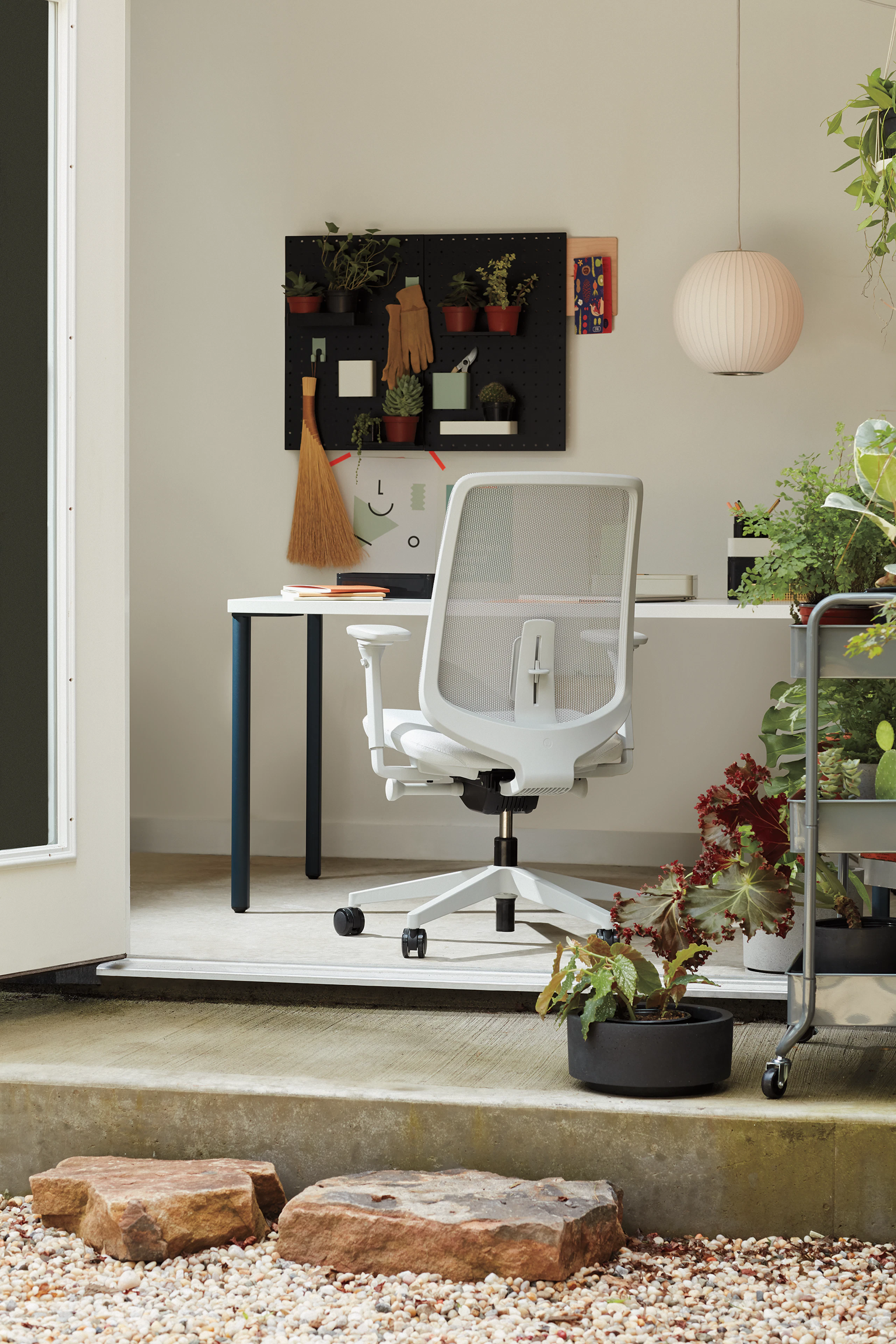 White Verus Chair with blue and white OE1 Rectangular Table in a home office setting.