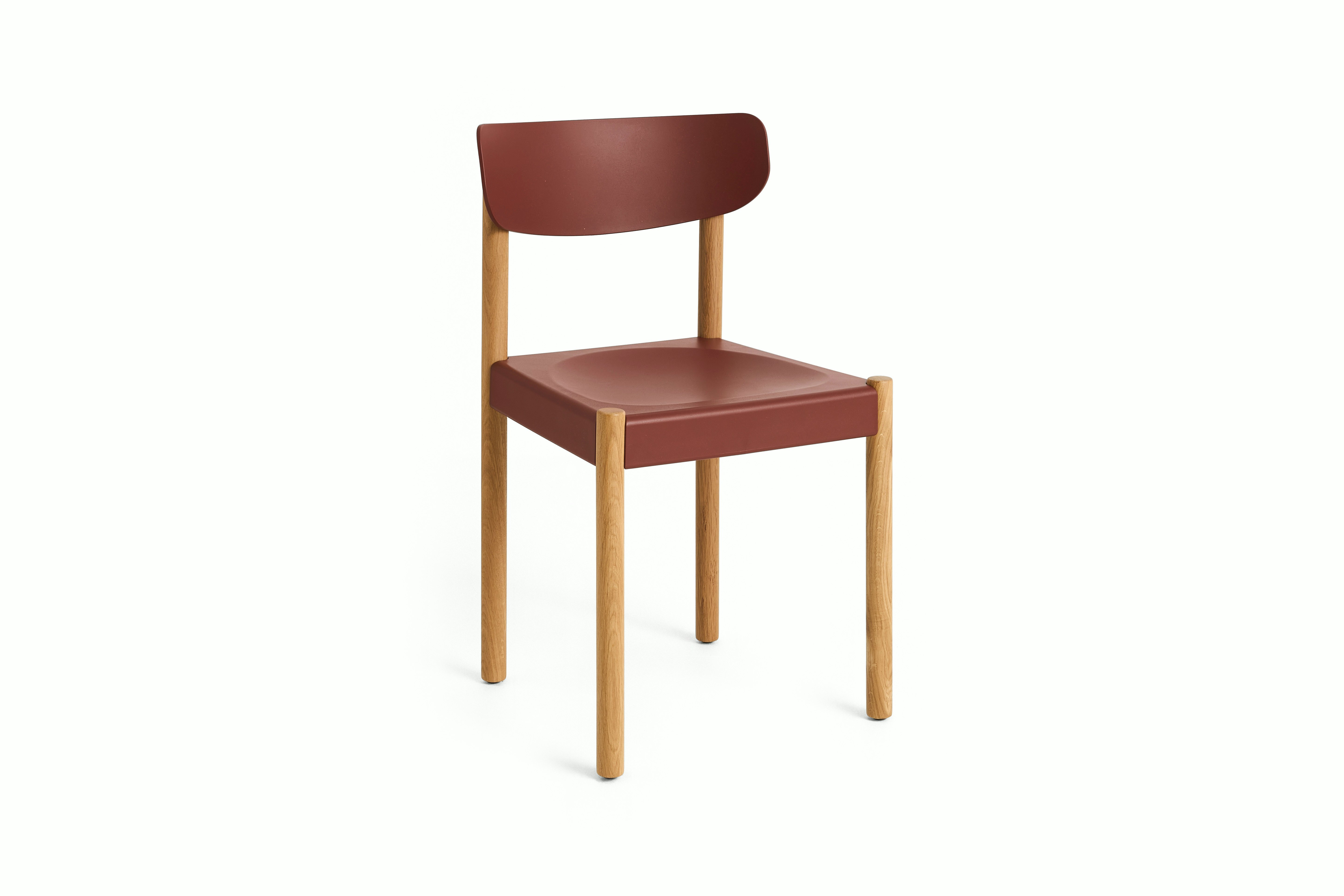 Pack Side Chair with red seat and back on oak legs, angled view
