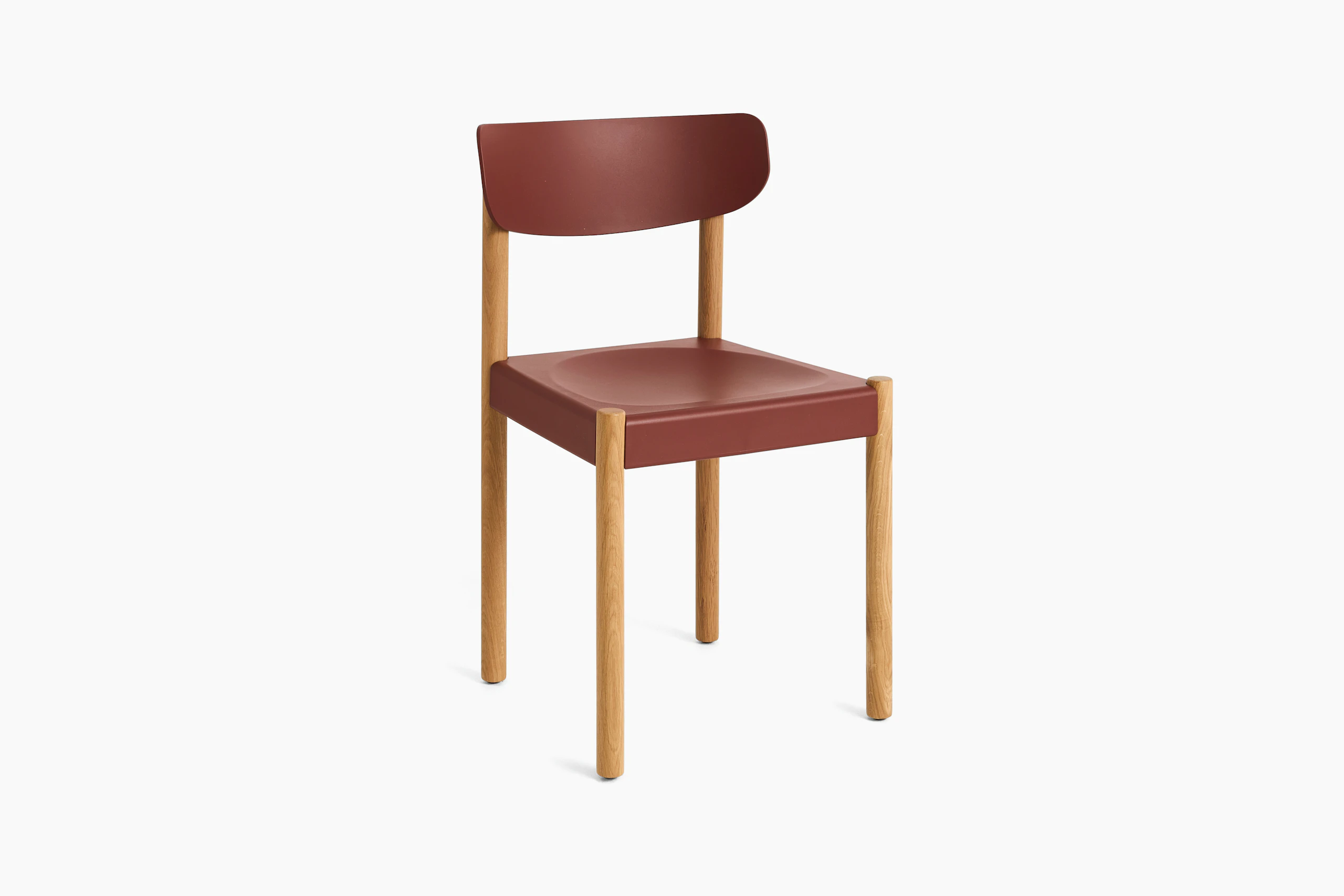Pack Side Chair with red seat and back on oak legs, angled view