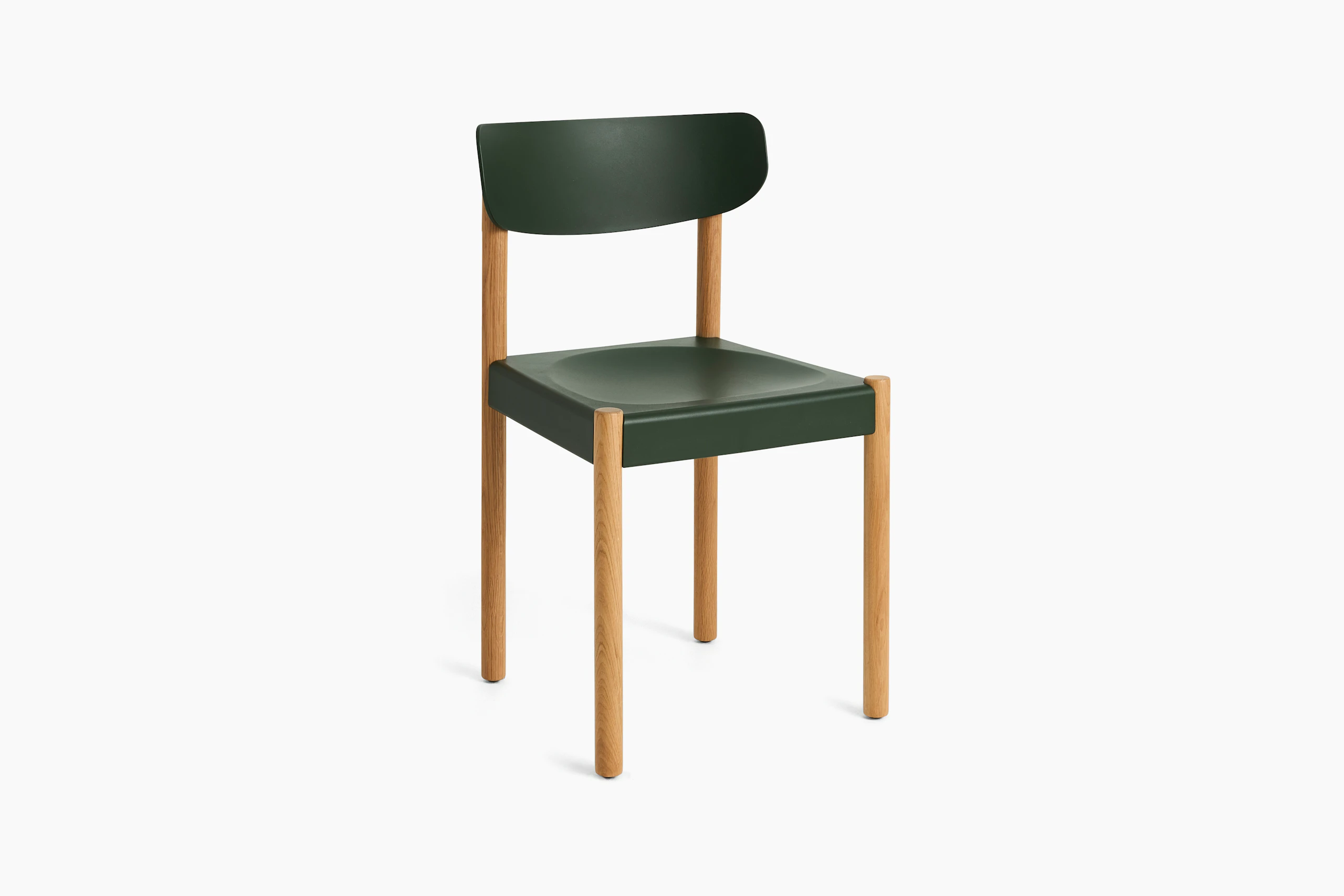 Pack Side Chair with green seat and back on oak legs, angled view