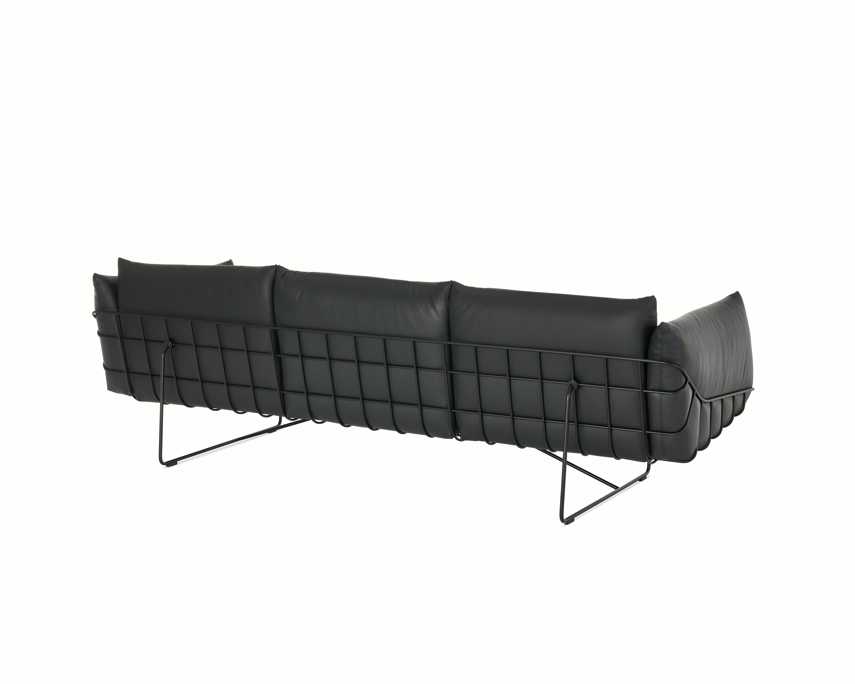 Wireframe Sofa three seater with black leather cushions and black frame. 