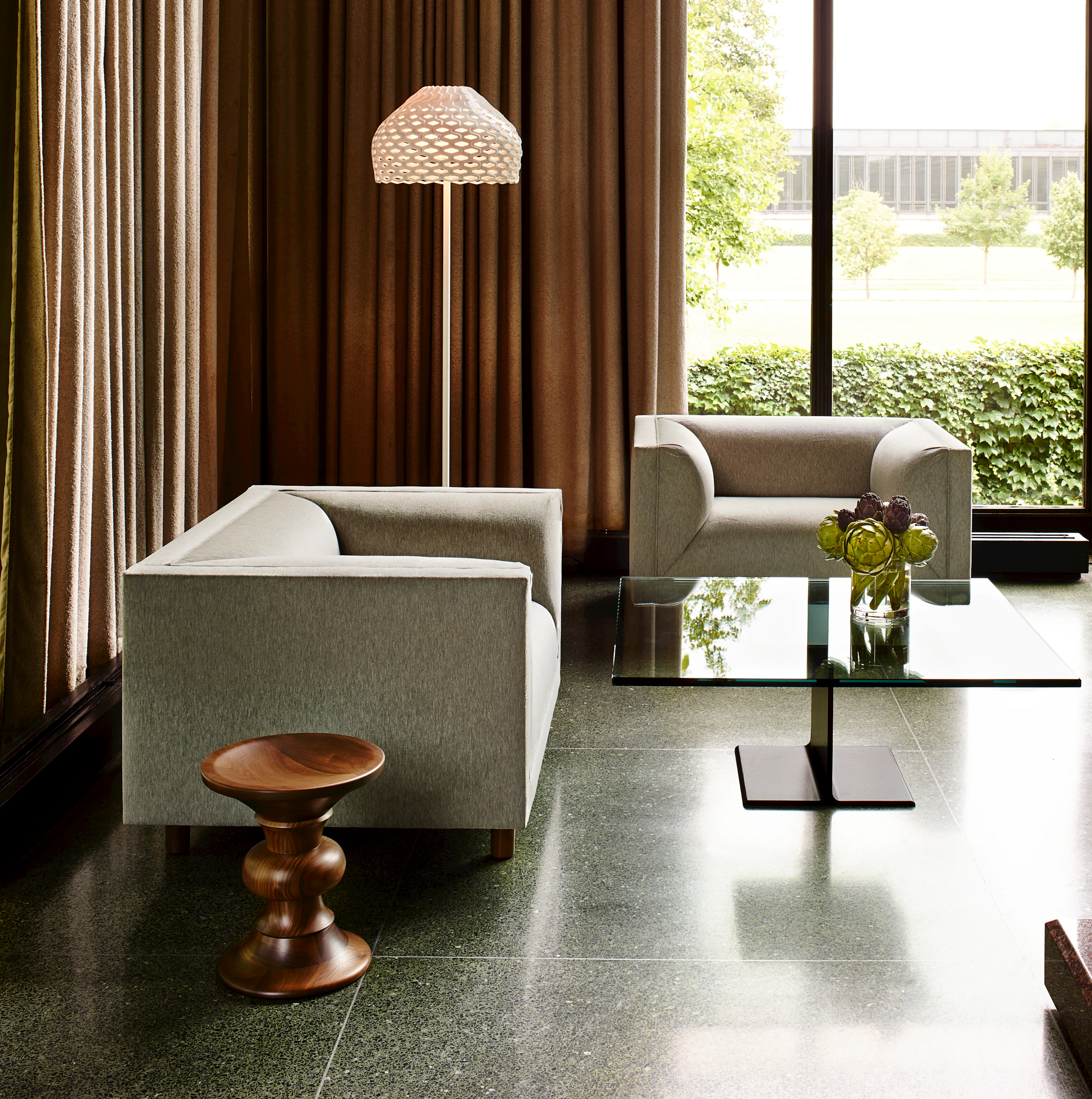 Collection Locations 2013 shot by Francois Dischinger, Rolled Arm Club Chairs with a I Beam table in a community setting.