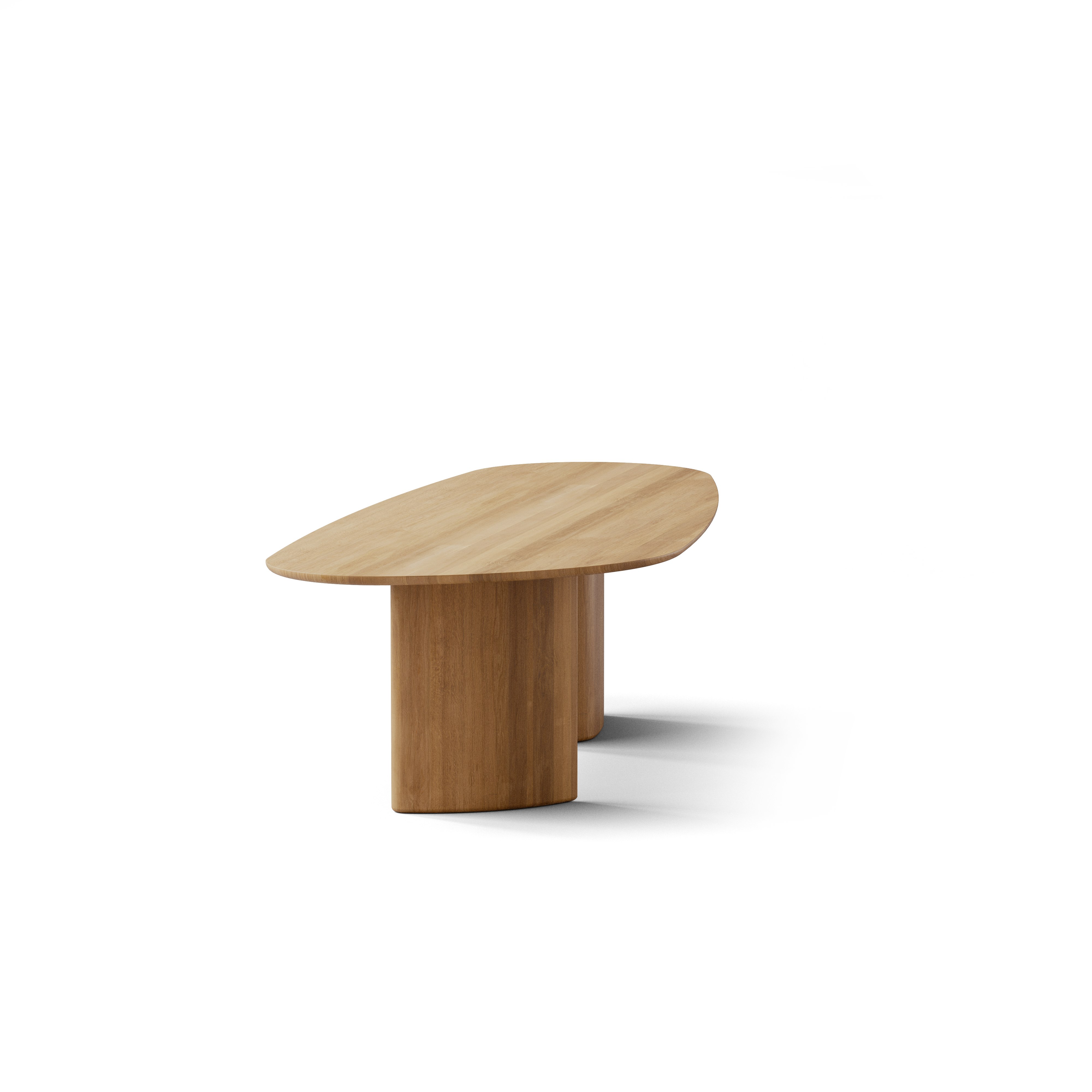 A Tangent Dining Table in Oak viewed from the side.