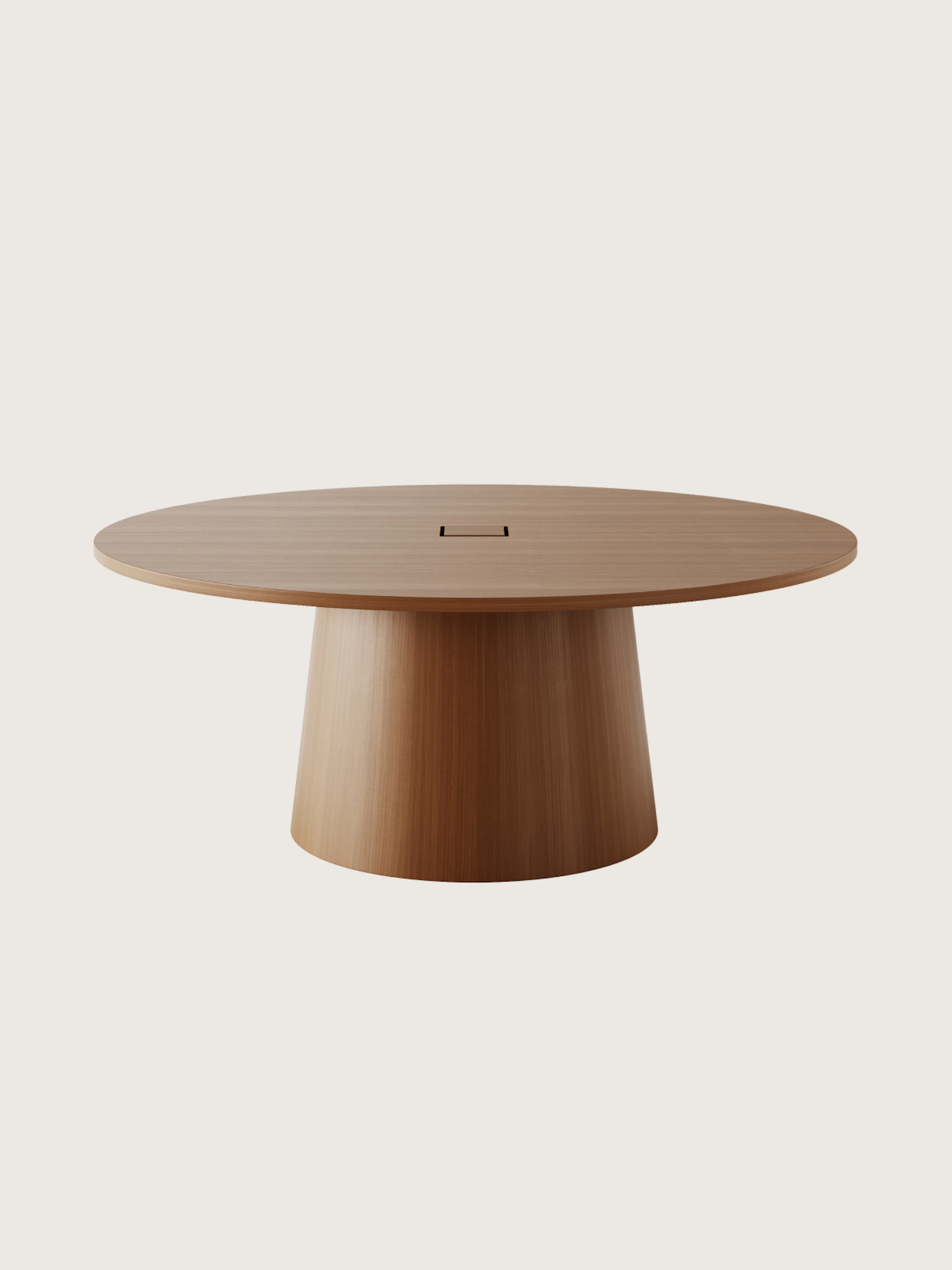 JD Meeting Table with round top and round tapered base in natural quarter cut walnut shown front-facing on a white sweep.