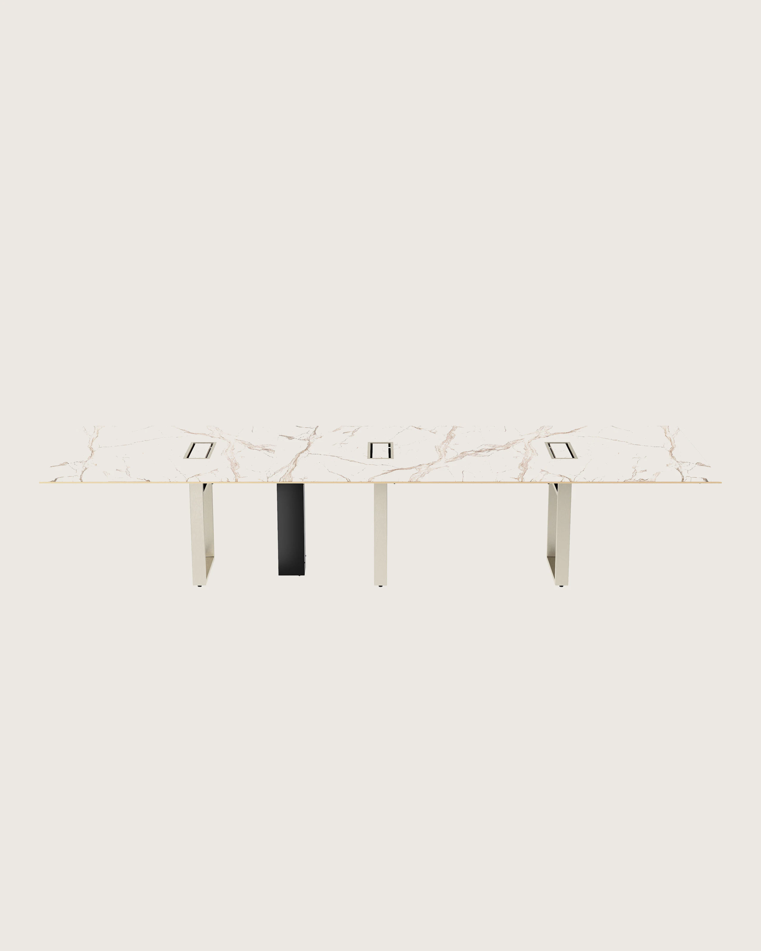 Highline Conference Table in Calacatta Gold Stone with leather edge detail and Satin Nickel base viewed from the front.