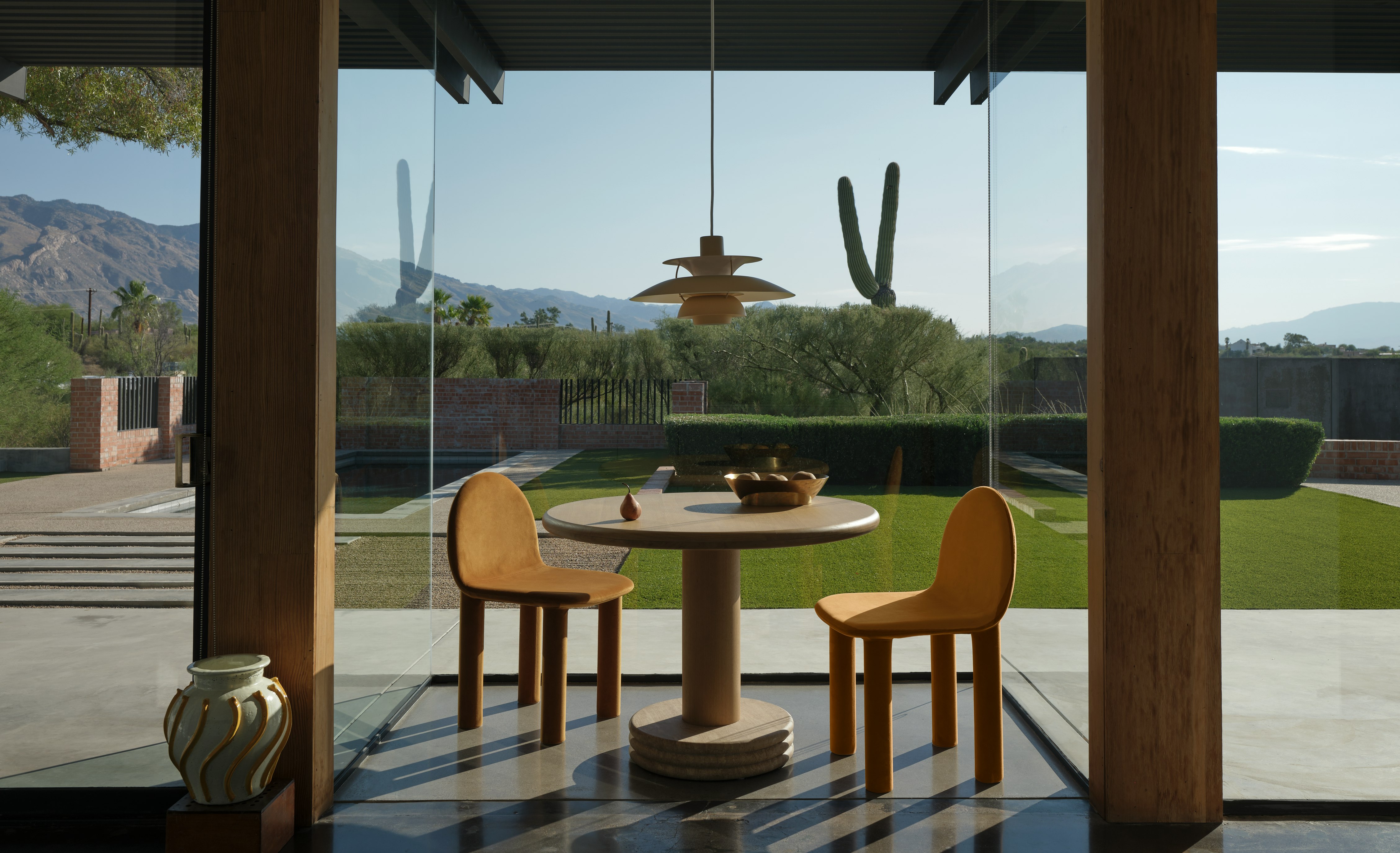 Bistro Dining Table with Arch Chairs in Camel