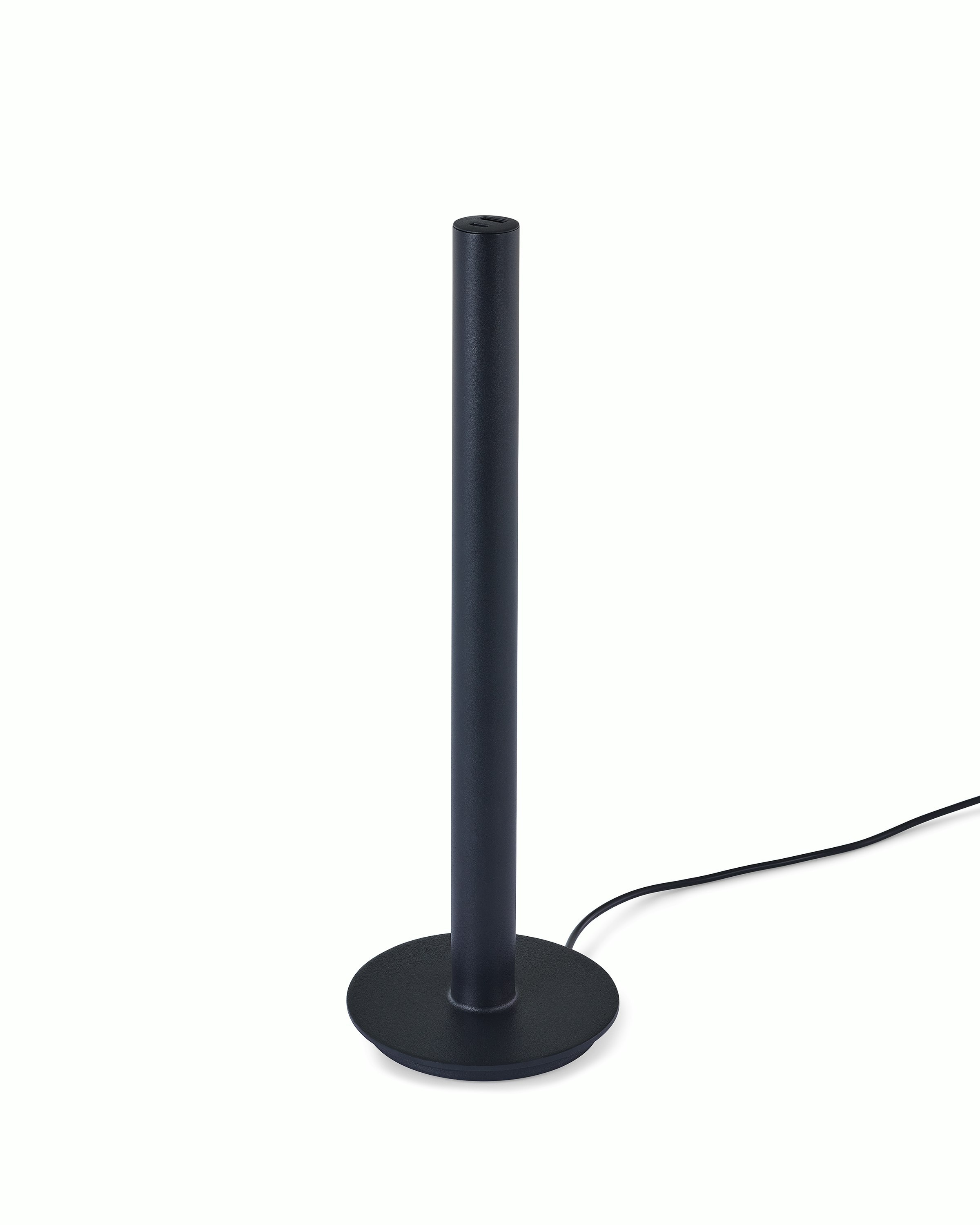 A black Logic Micro Tower with a power cord.