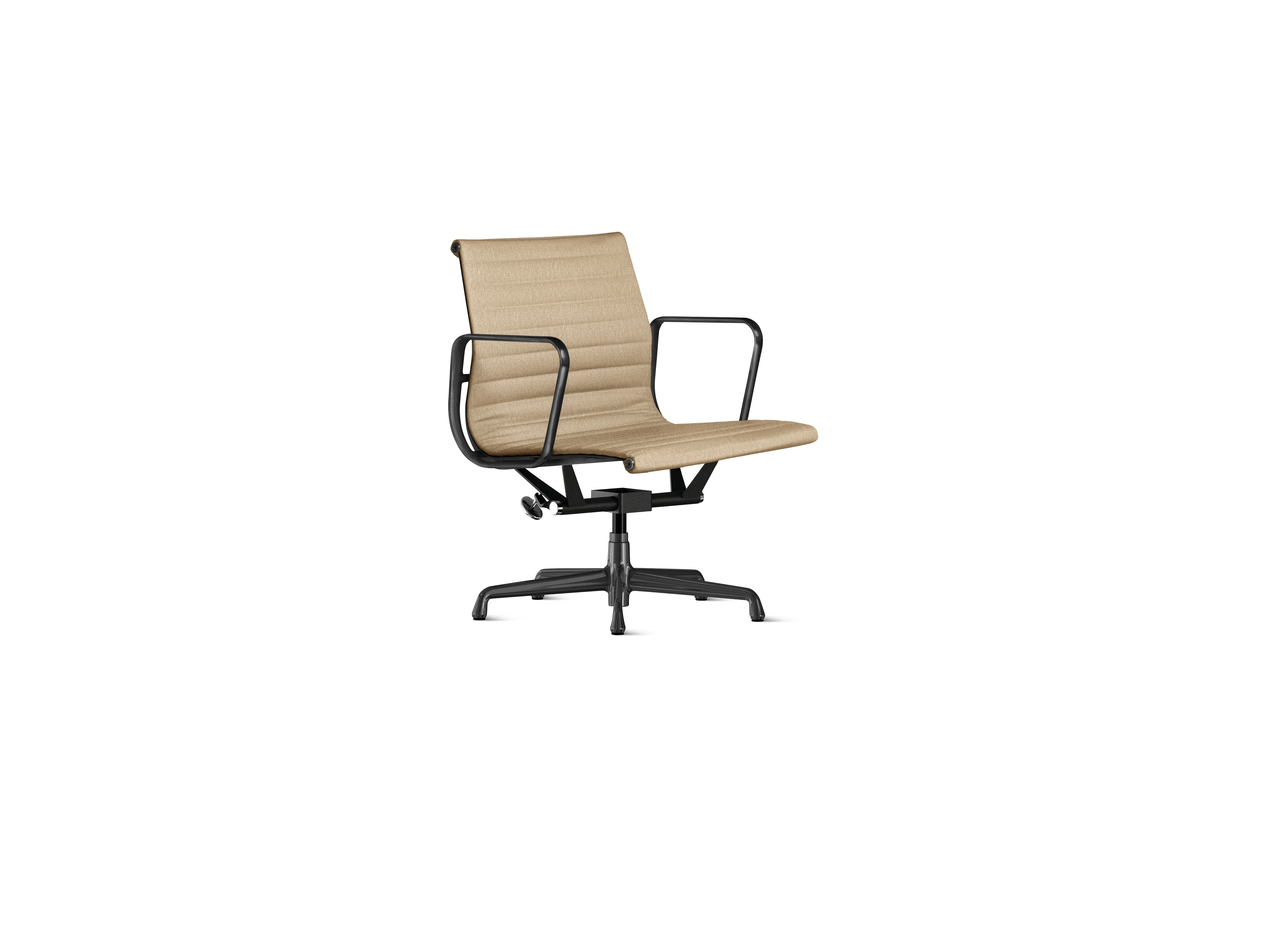 A Eames Aluminum Group Chairs in straw and black viewed from an angle.