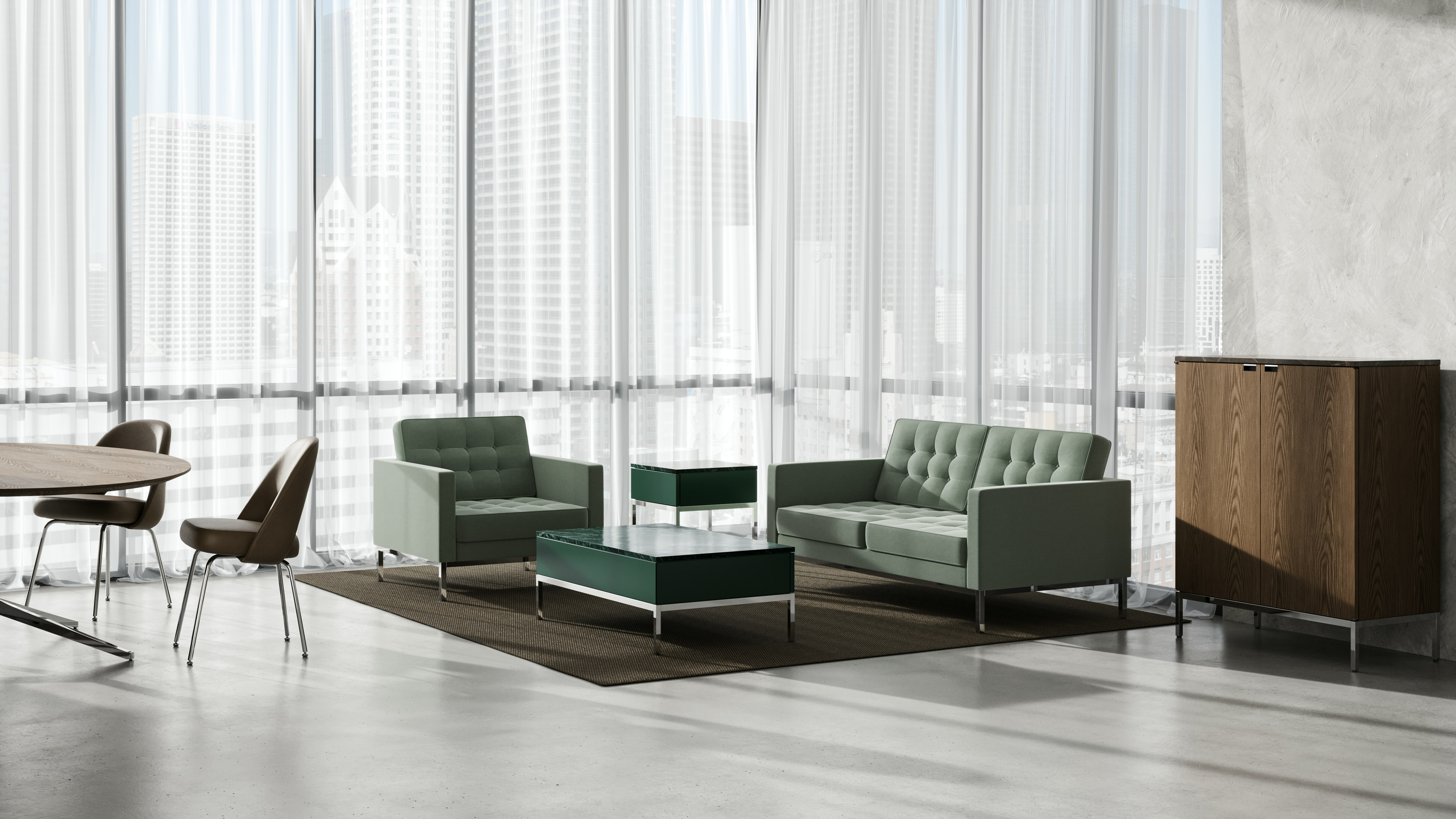 Two green Knoll Chermayeff Tables with gray Florence Knoll Lounge Chairs and Credenza in an office setting.