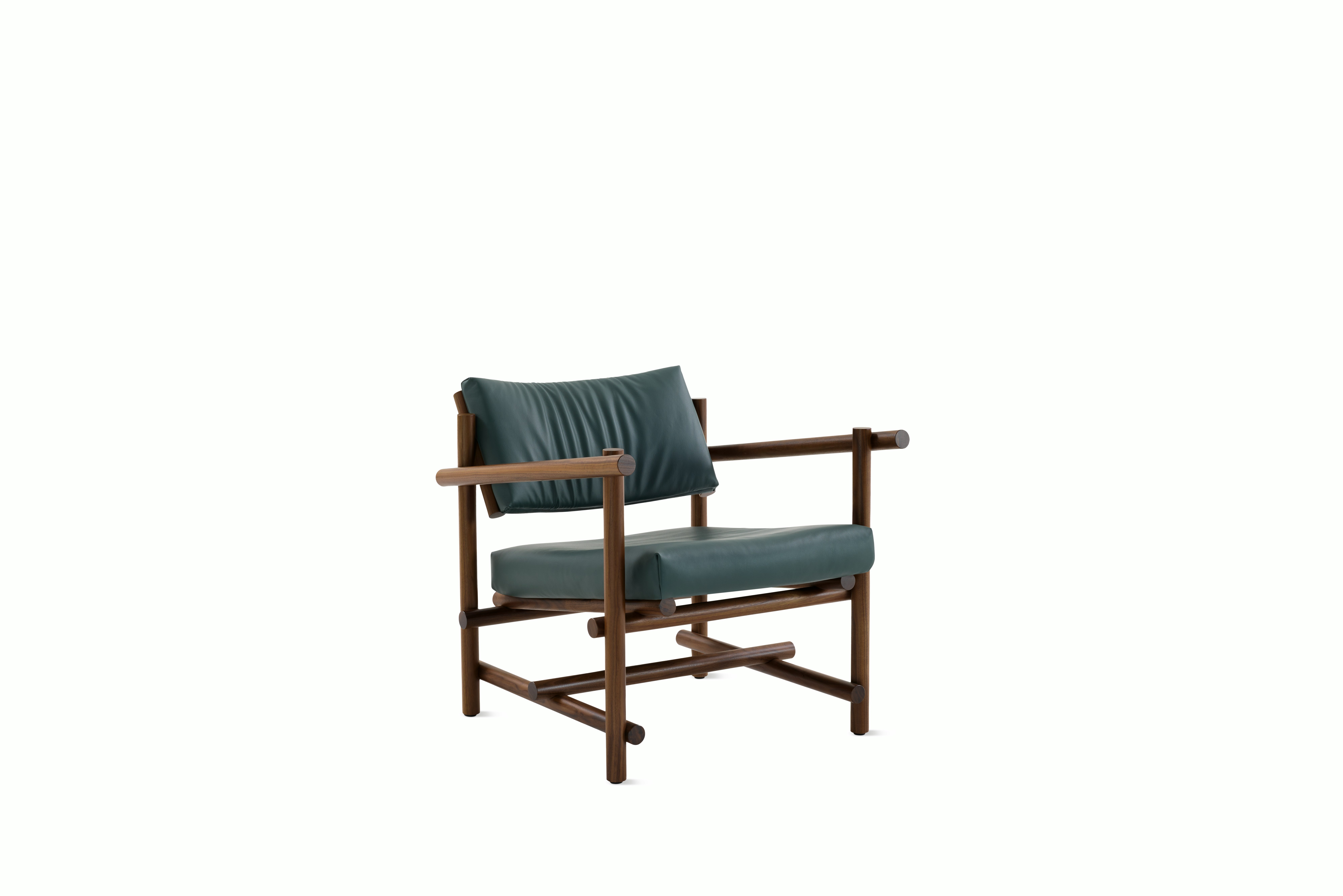 A Muecke Lounge Chair in Forest Green Walnut viewed from an angle.