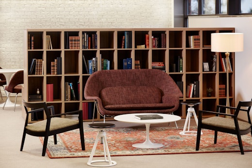 Knoll Essentials anchor storage open lockers Saarinen table Krusin lounge chair Womb settee Piton stool Saarinen Executive Armless chair Community Space Activity Space Library