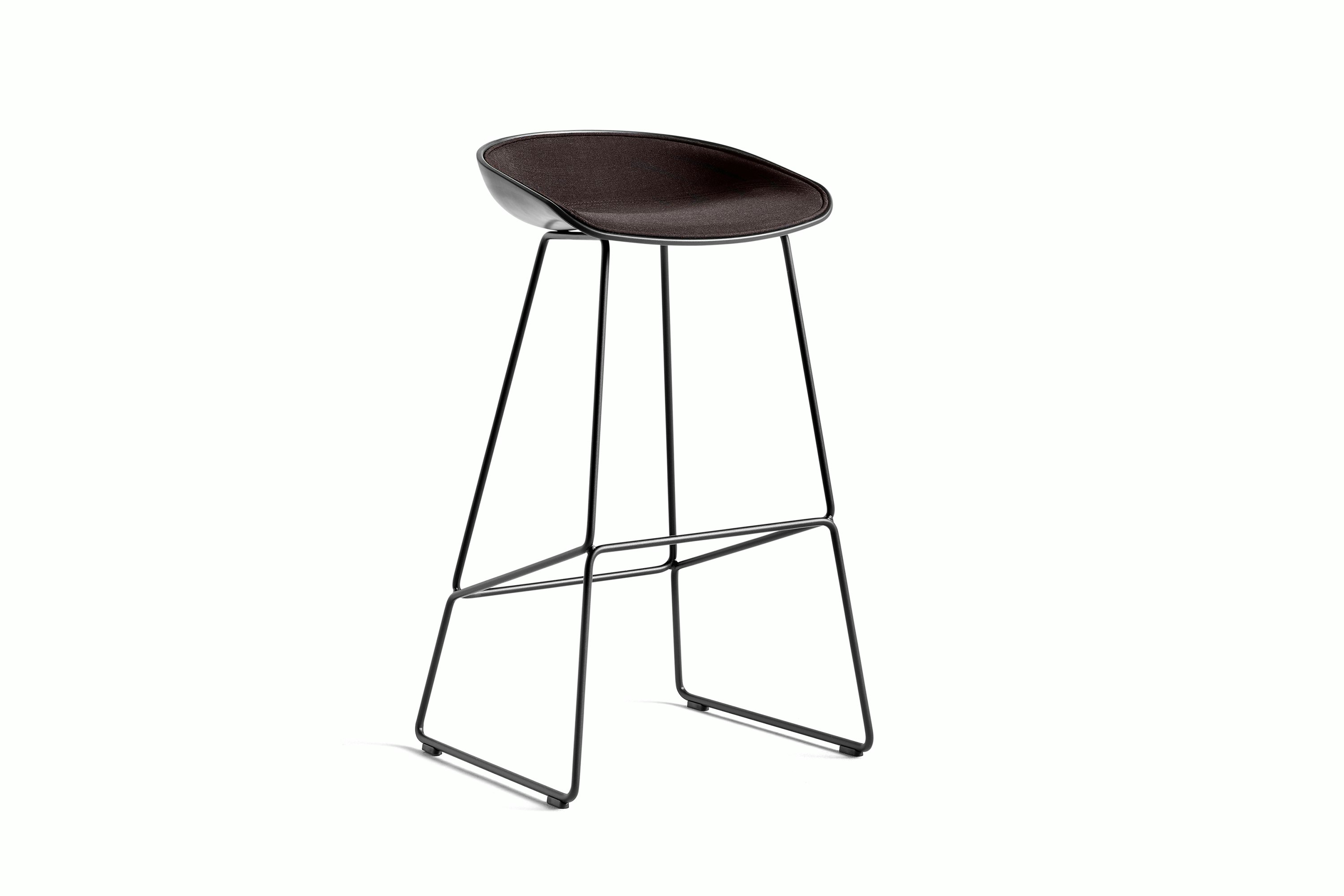Black upholstered About A Stool with wooden base, viewed at an angle.